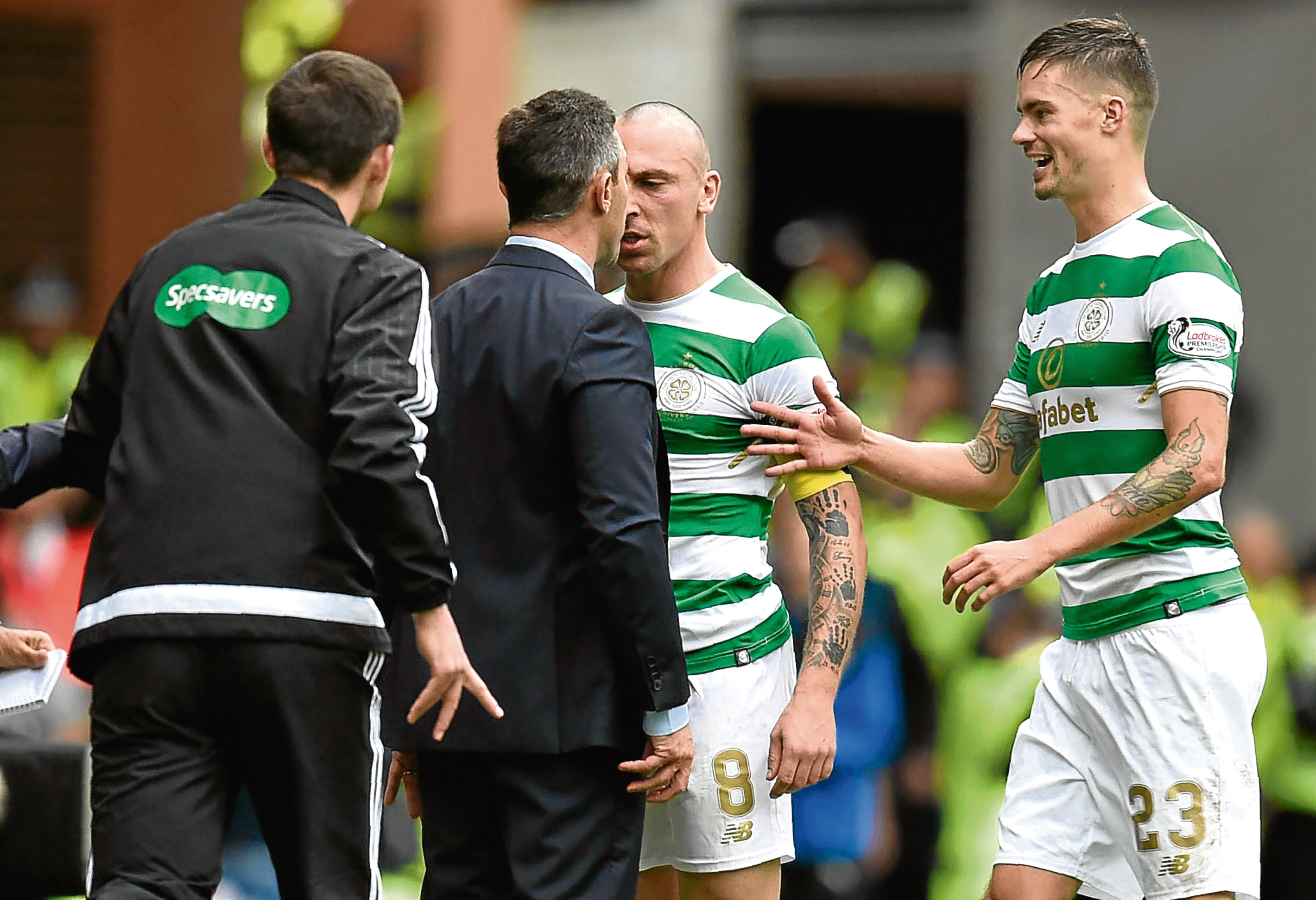 Celtic's Scott Brown (right) exchanges words with Rangers manager Pedro Caixinha (SNS Group)