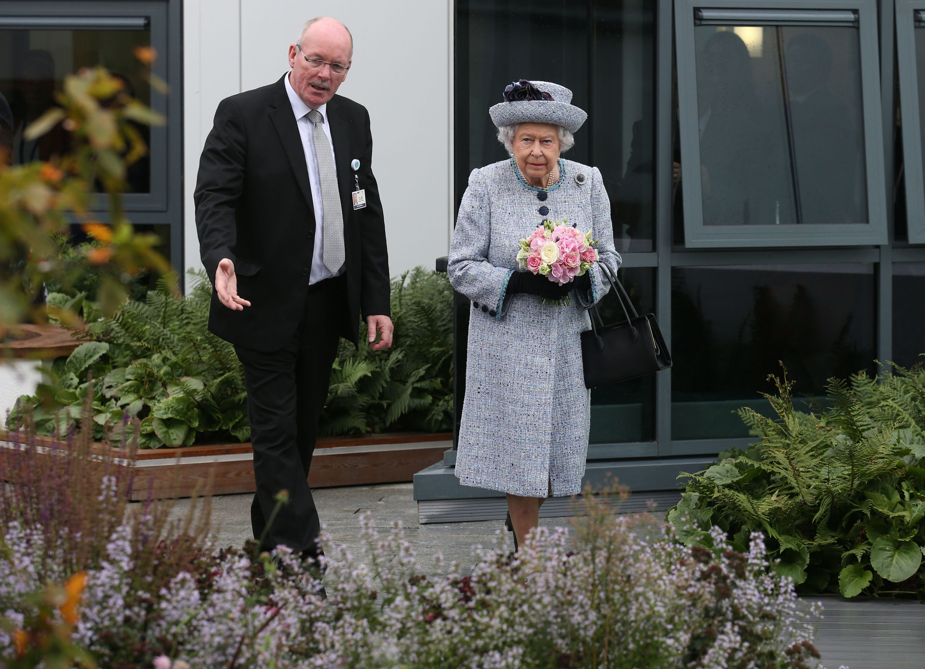 Queen Elizabeth II with NHS Grampian Reverend James Falconer, Healthcare Chaplain and project lead for the Robertson Family Roof Garden, during a visit to Aberdeen Royal Infirmary to open the roof garden and meet patients and staff. (Andrew Milligan/PA Wire)