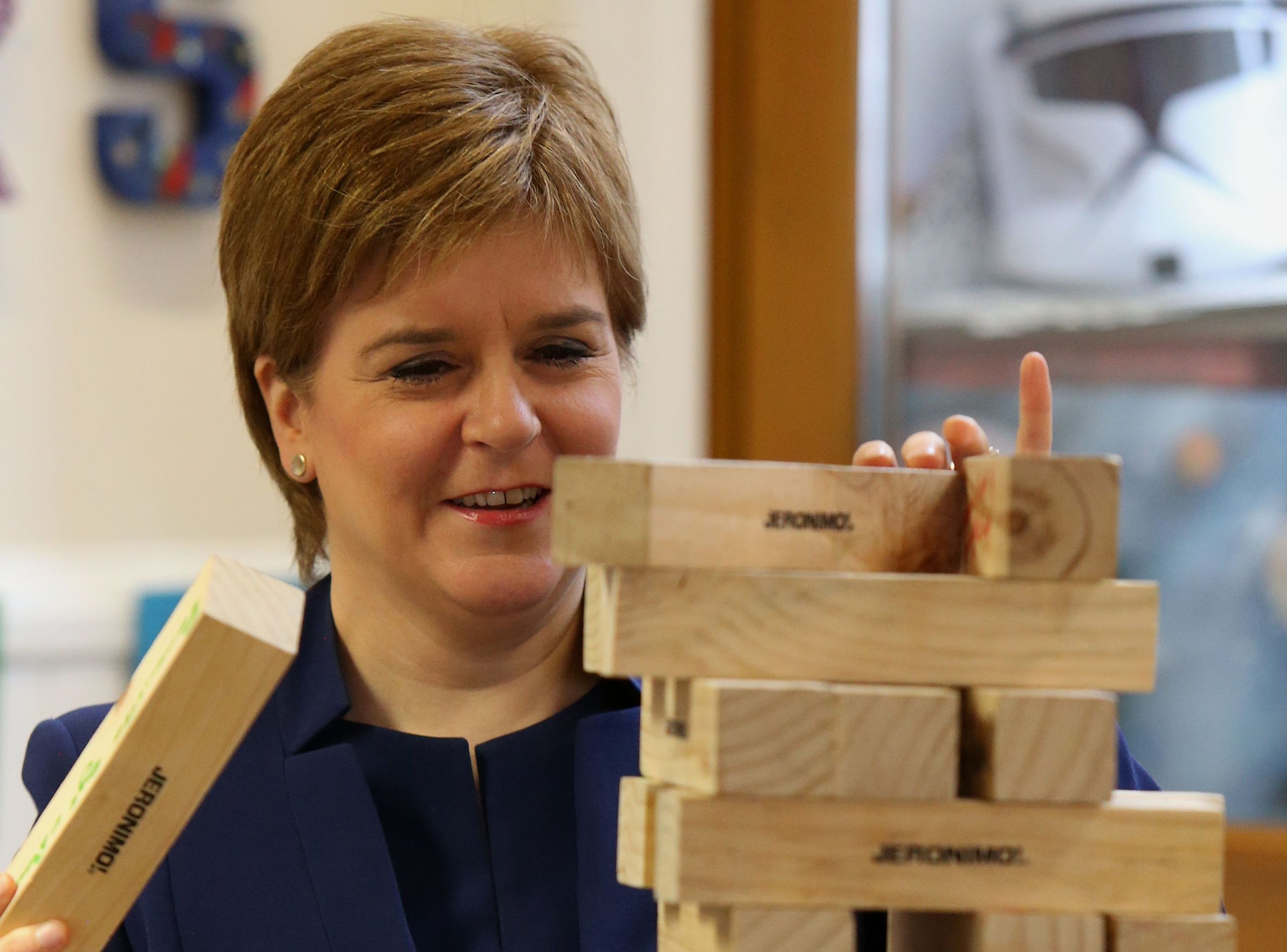 First Minister Nicola Sturgeon playing jenga at the launch of a new young carers grant at Edinburgh Young Carers Project. (Gordon Terris/The Herald/PA Wire)
