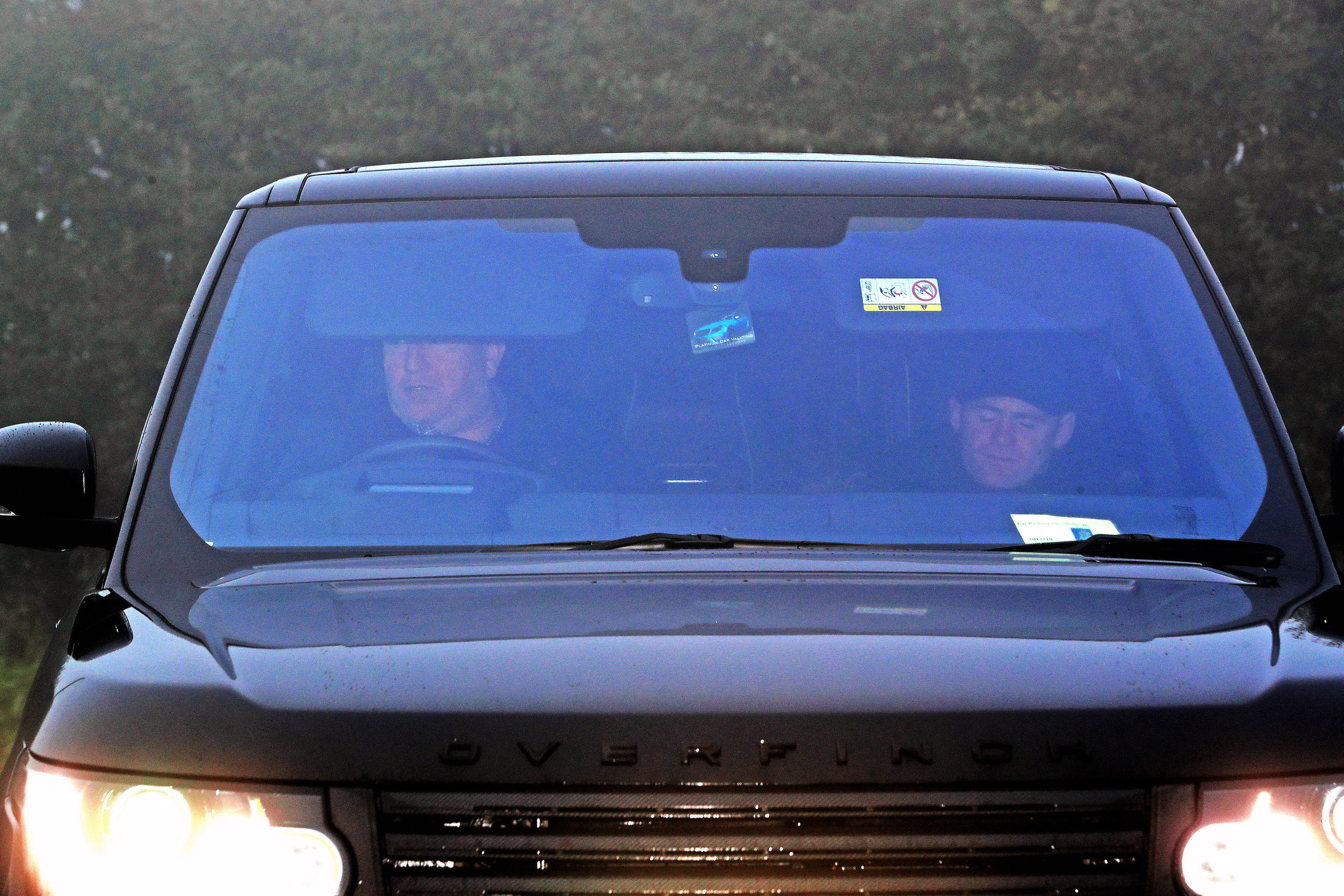 Wayne Rooney is driven in to Everton's Finch Farm Training Ground, after being banned from driving for two years and ordered to perform 100 hours of unpaid work as part of a 12-month community order. (Peter Byrne/PA Wire)