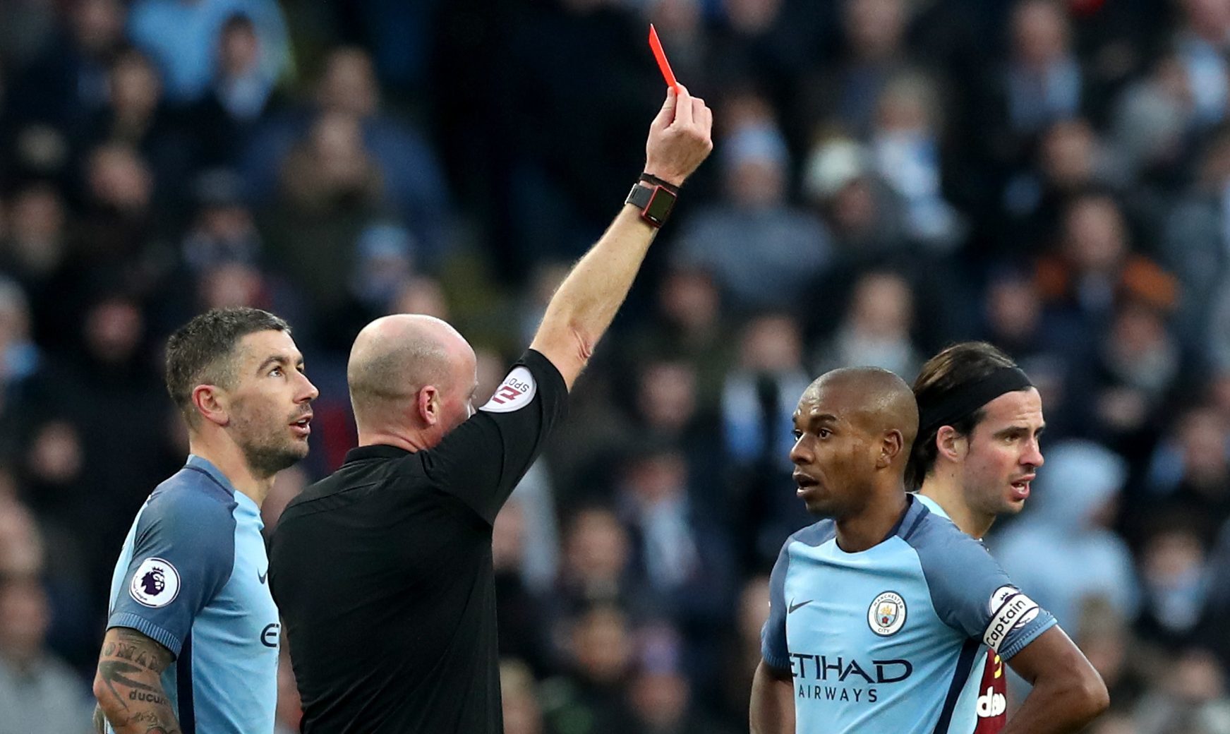 Manchester City's Fernandinho is shown a red card earlier this year (Martin Rickett/PA Wire)