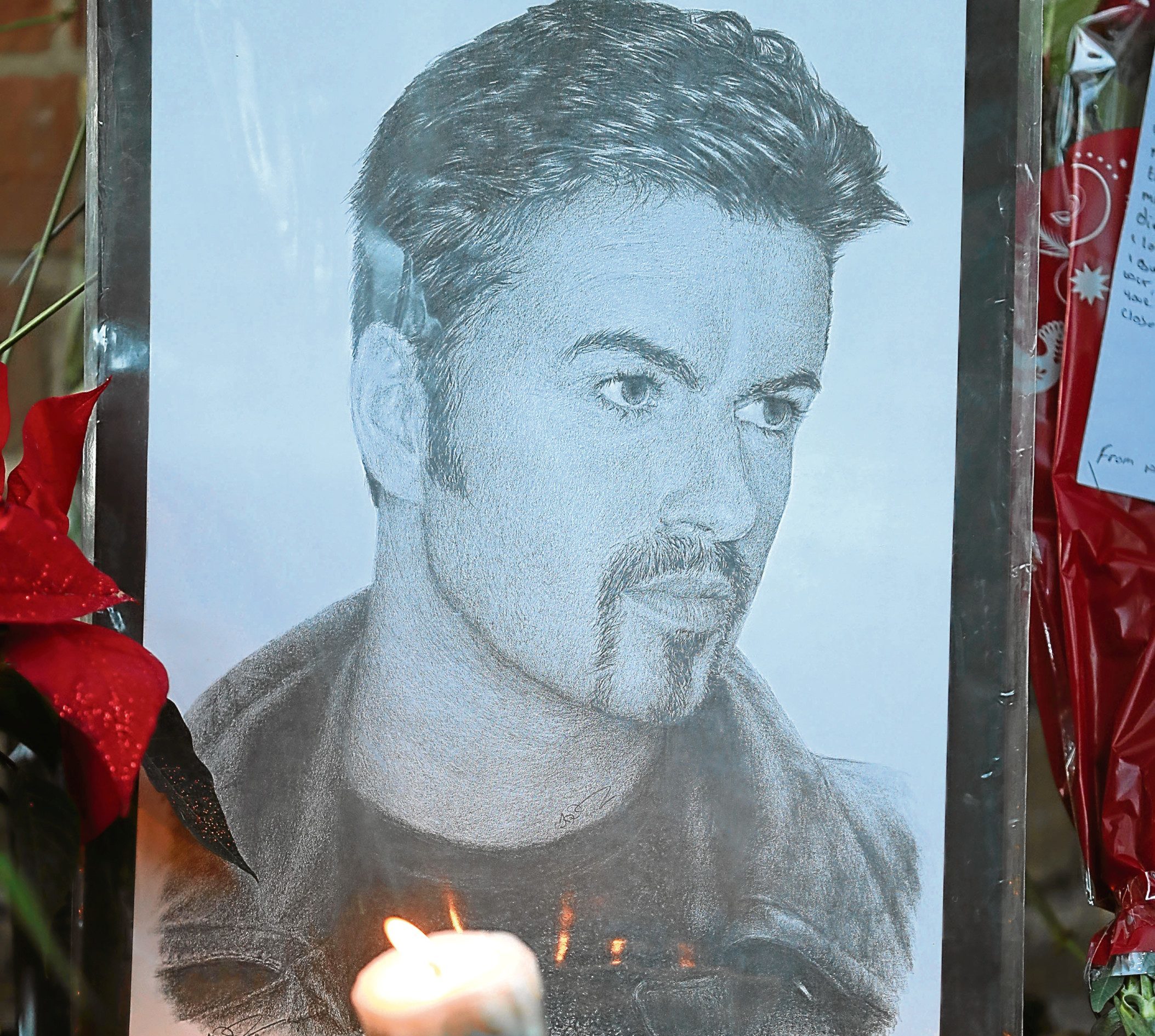Tributes outside the Goring house of George Michael (Andrew Matthews/PA Wire)