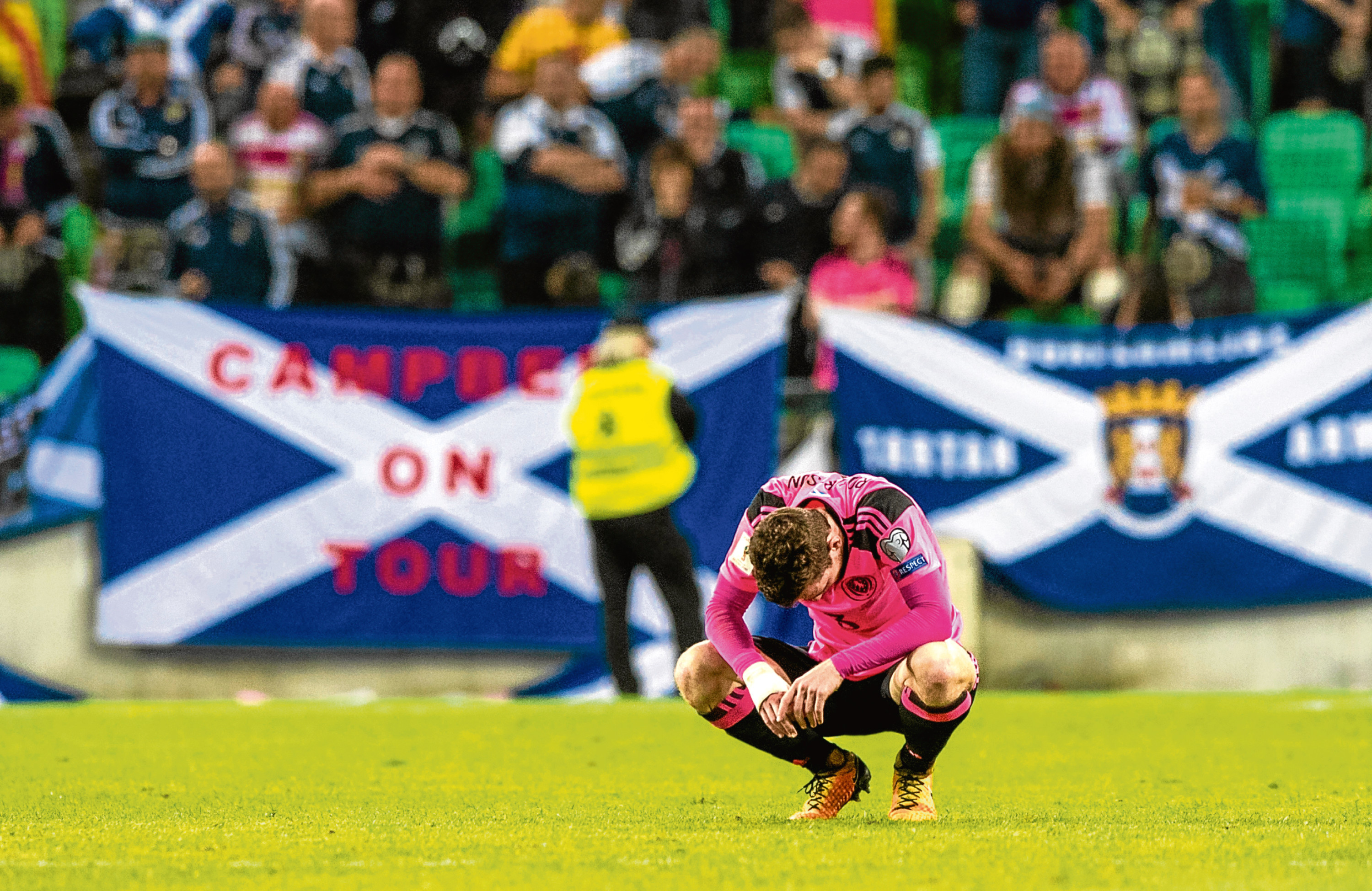 Dejection for Scotland's Andrew Robertson (SNS)