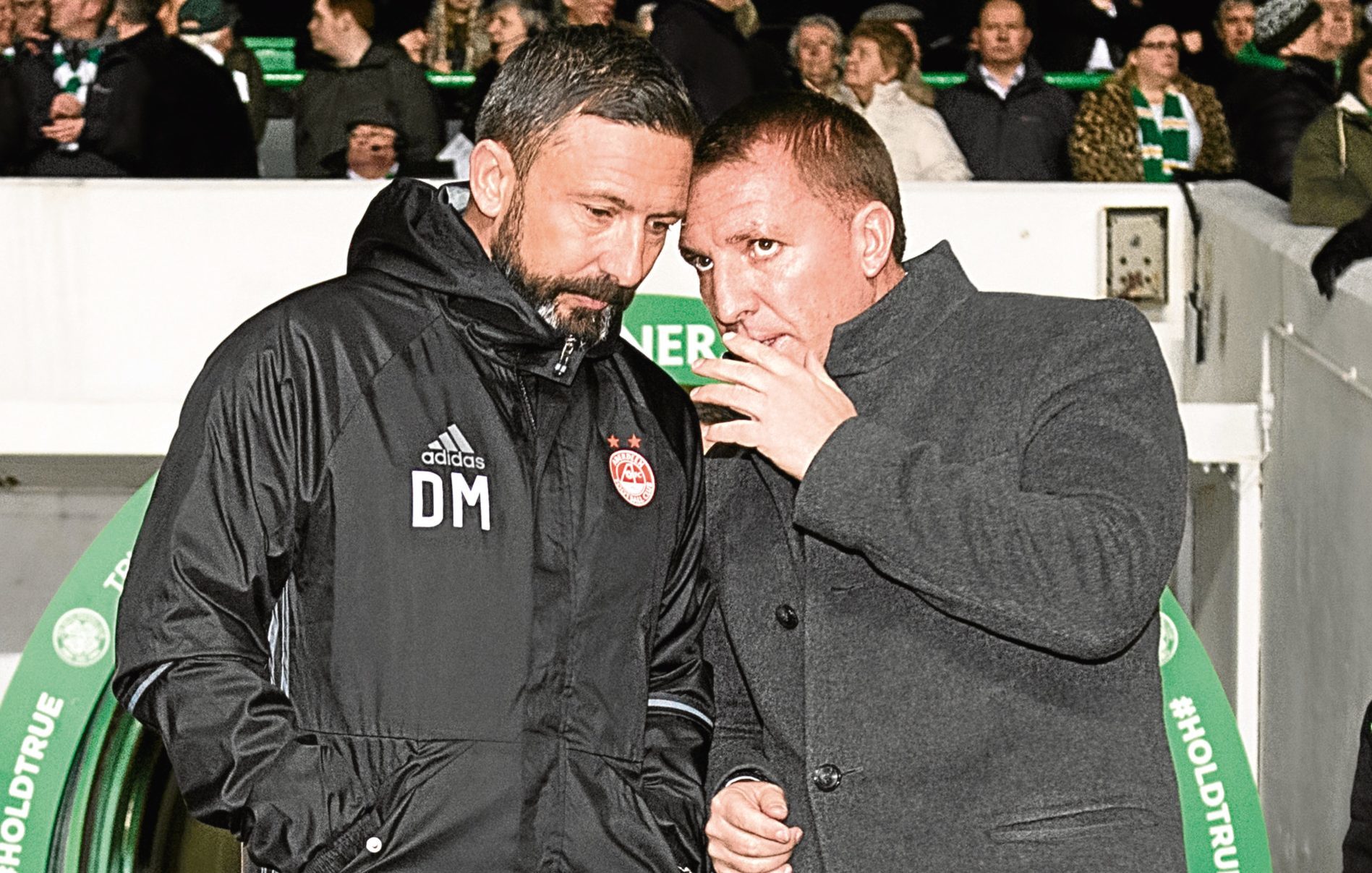 Aberdeen manager Derek McInnes (left) and Celtic boss Brendan Rodgers share some words on the touchline (SNS Group)