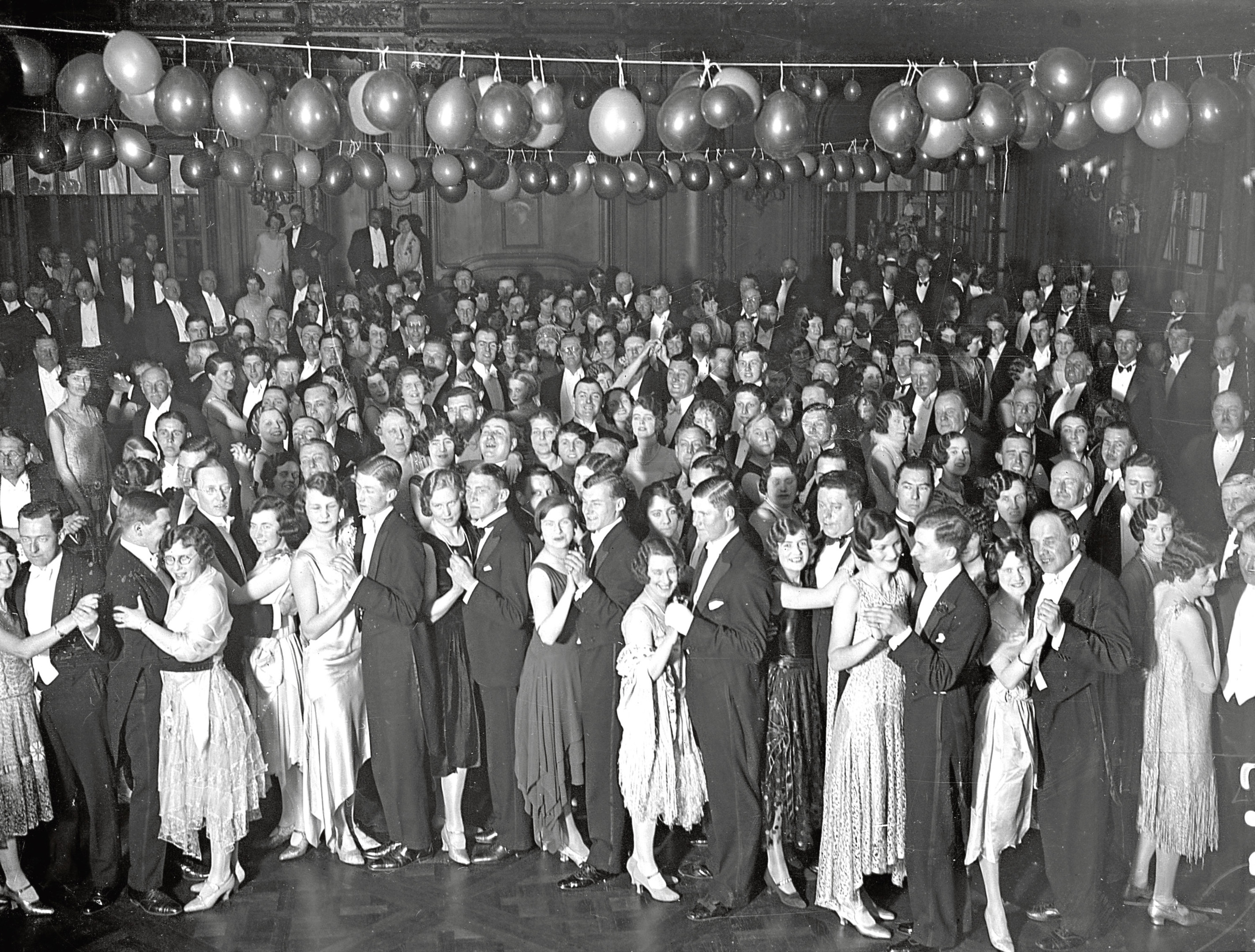 Guests dancing in the ballroom aboard Cunard liner 'Berengaria' at Southampton Docks. They are attending a dance and cabaret to raise funds for charity. (Puttnam/Getty Images)