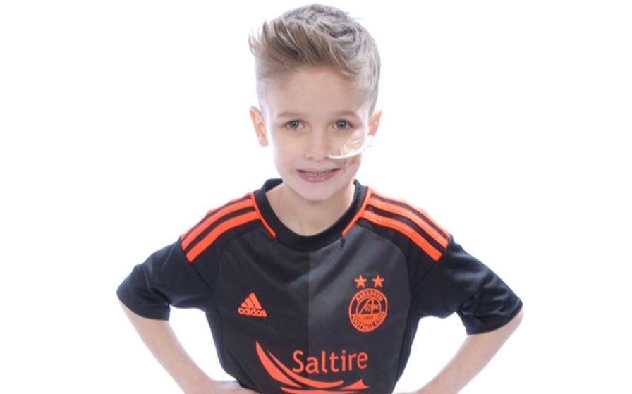 Little Ashton Hutcheson in the kit of his beloved Aberdeen