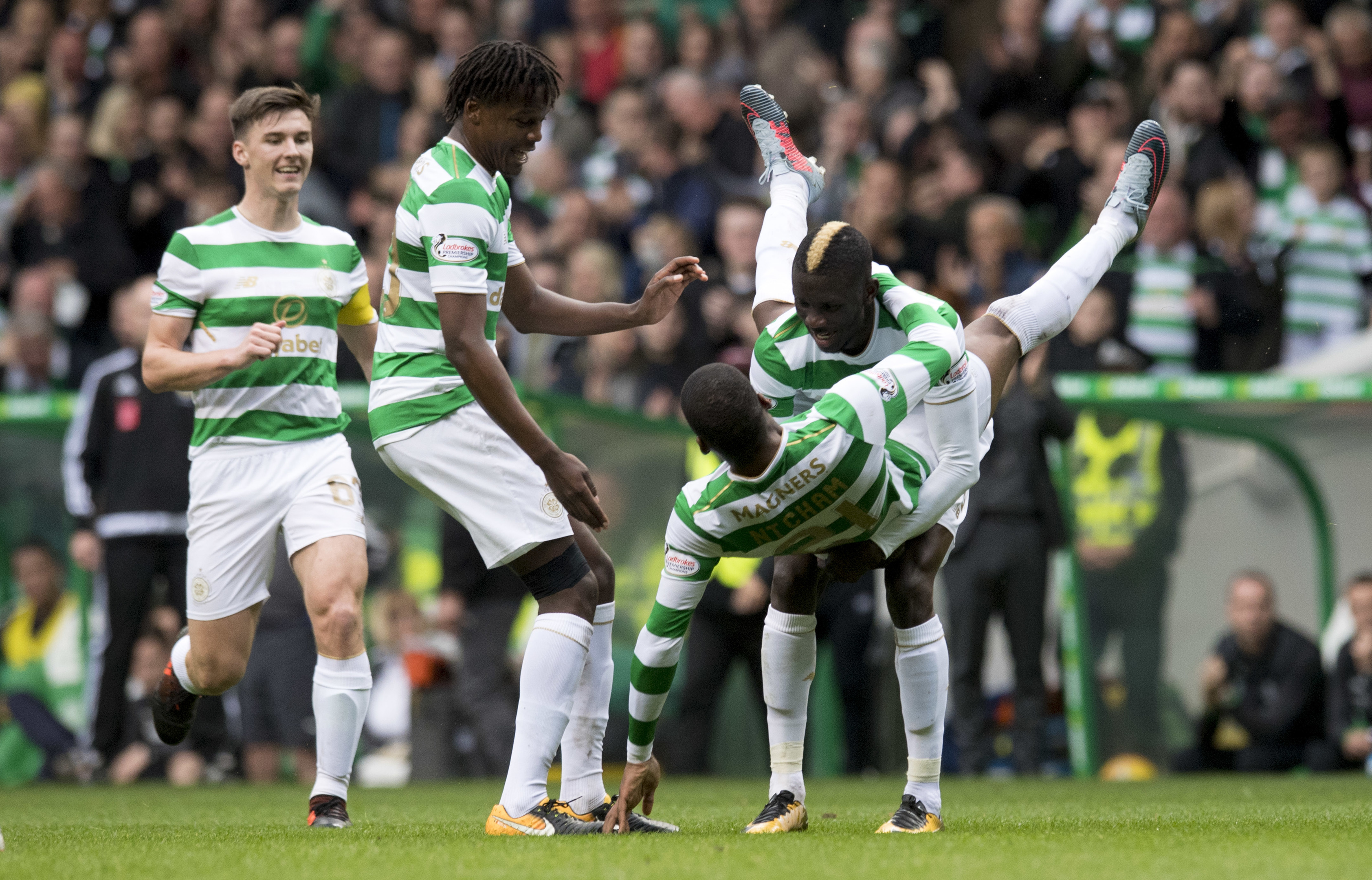 Celtic's Olivier Ntcham (right) celebrates his goal with his team-mates (SNS)