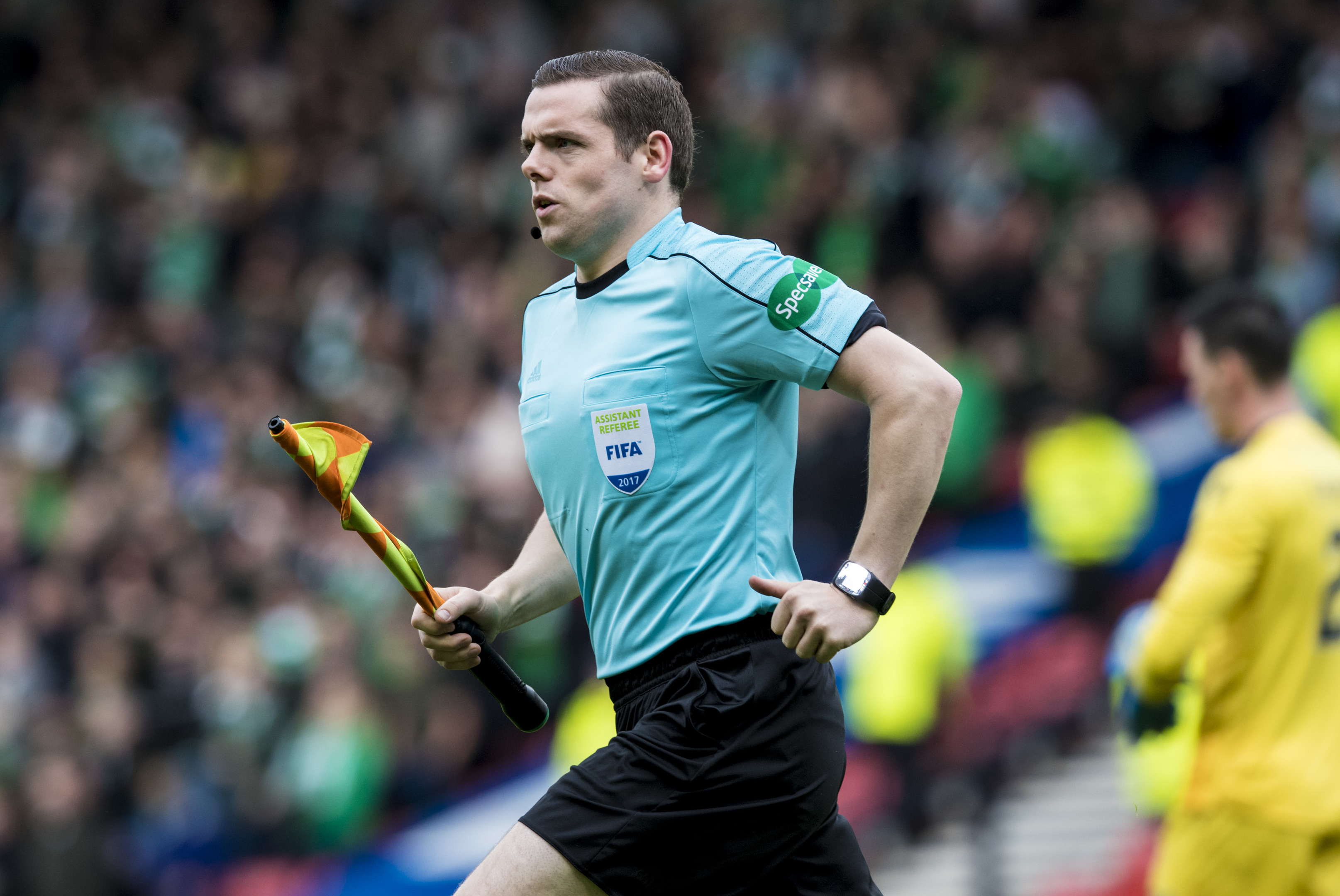 Conservative MP Douglas Ross running the line at yesterday's Hibs v Celtic match (SNS Group)