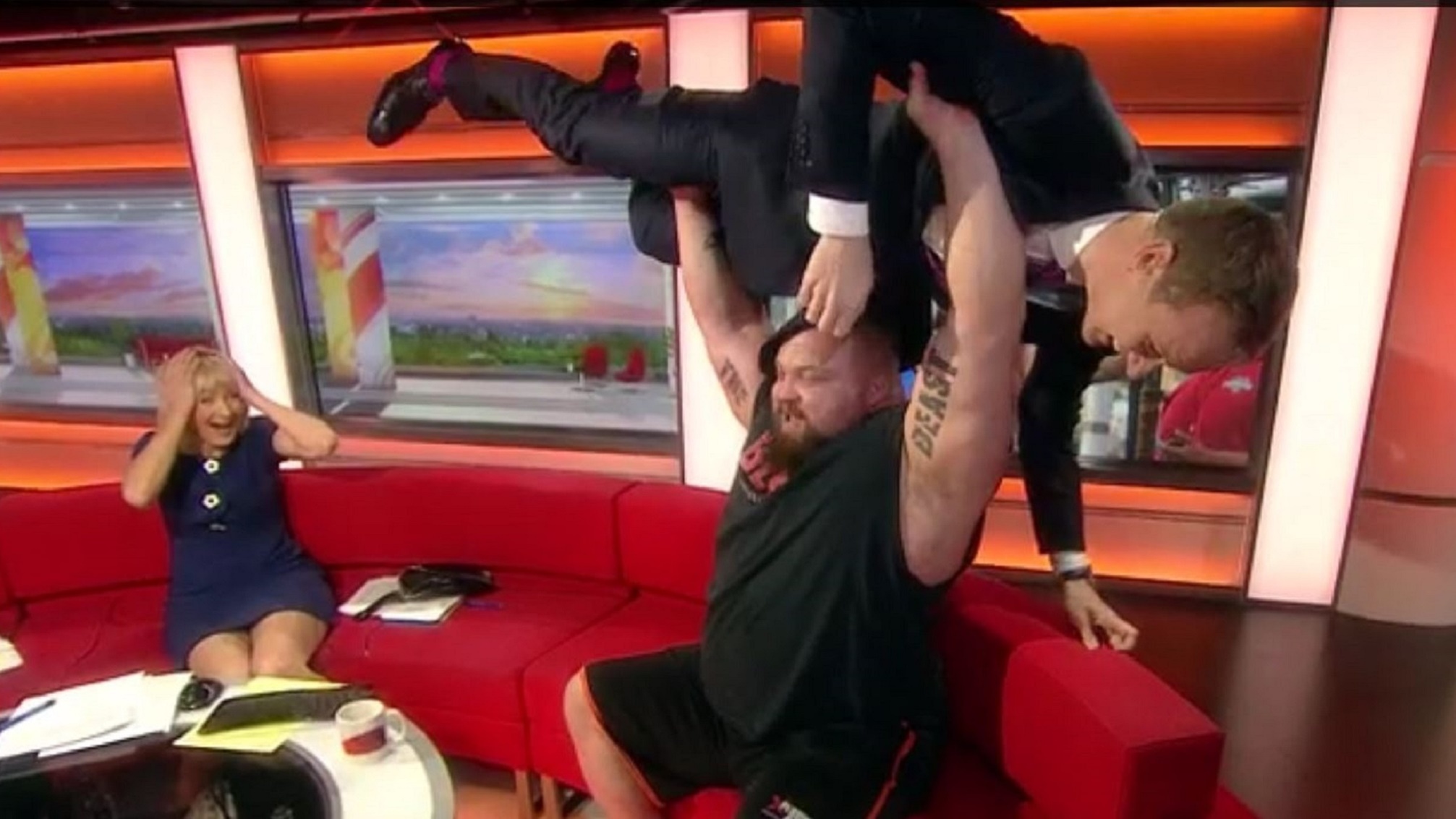 BBC Breakfast’s Dan Walker bench pressed during live broadcast (BBC/screengrab)