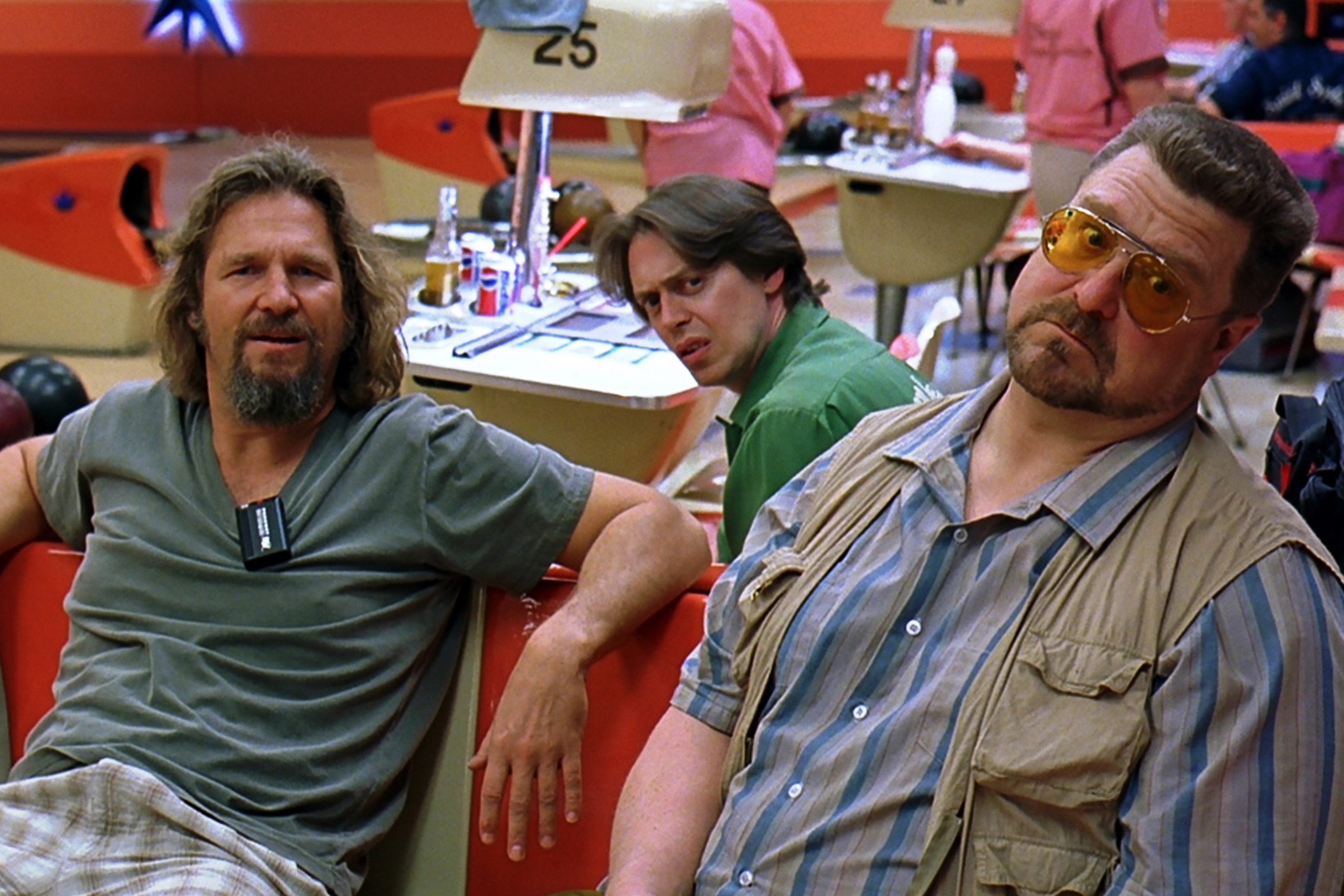 Jeff Bridges as “The Dude” hangs out at the bowling alley with his buddies Walter (John Goodman) and Donny (Steve Buscemi). Courtesy Universal Studios.
