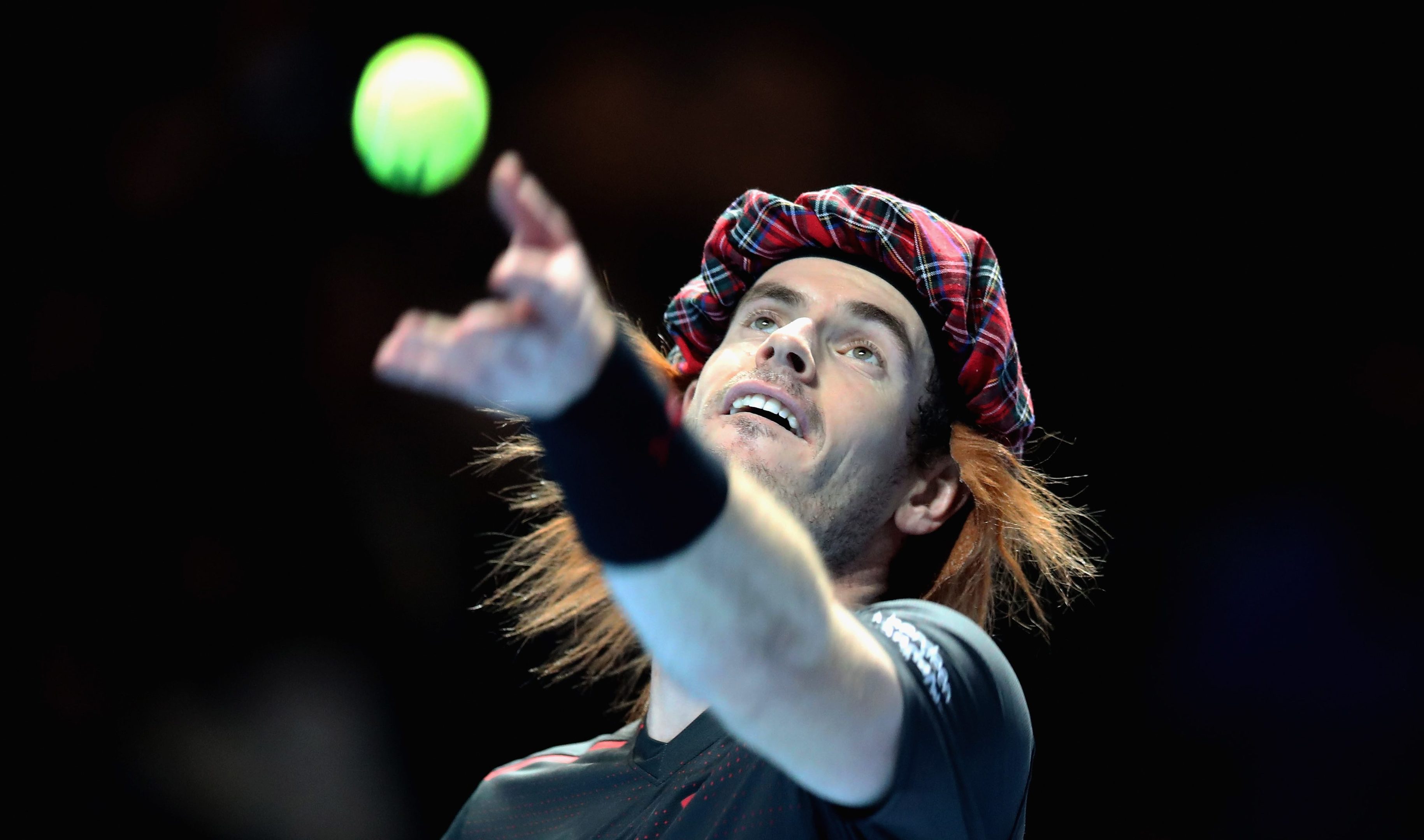 Andy Murray serves during his match against Roger Federer (Steve Welsh/Getty Images for Andy Murray Live)