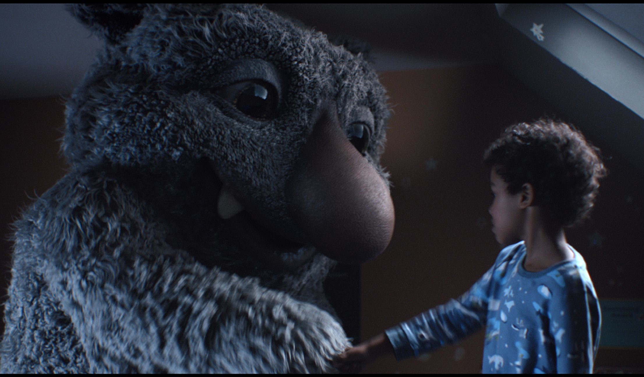 'Moz the Monster' and his seven-year-old host Joe are the stars of the new ad (John Lewis/PA Wire)