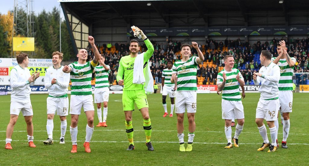 Celtic's players celebrate breaking their unbeaten record at full time (SNS)