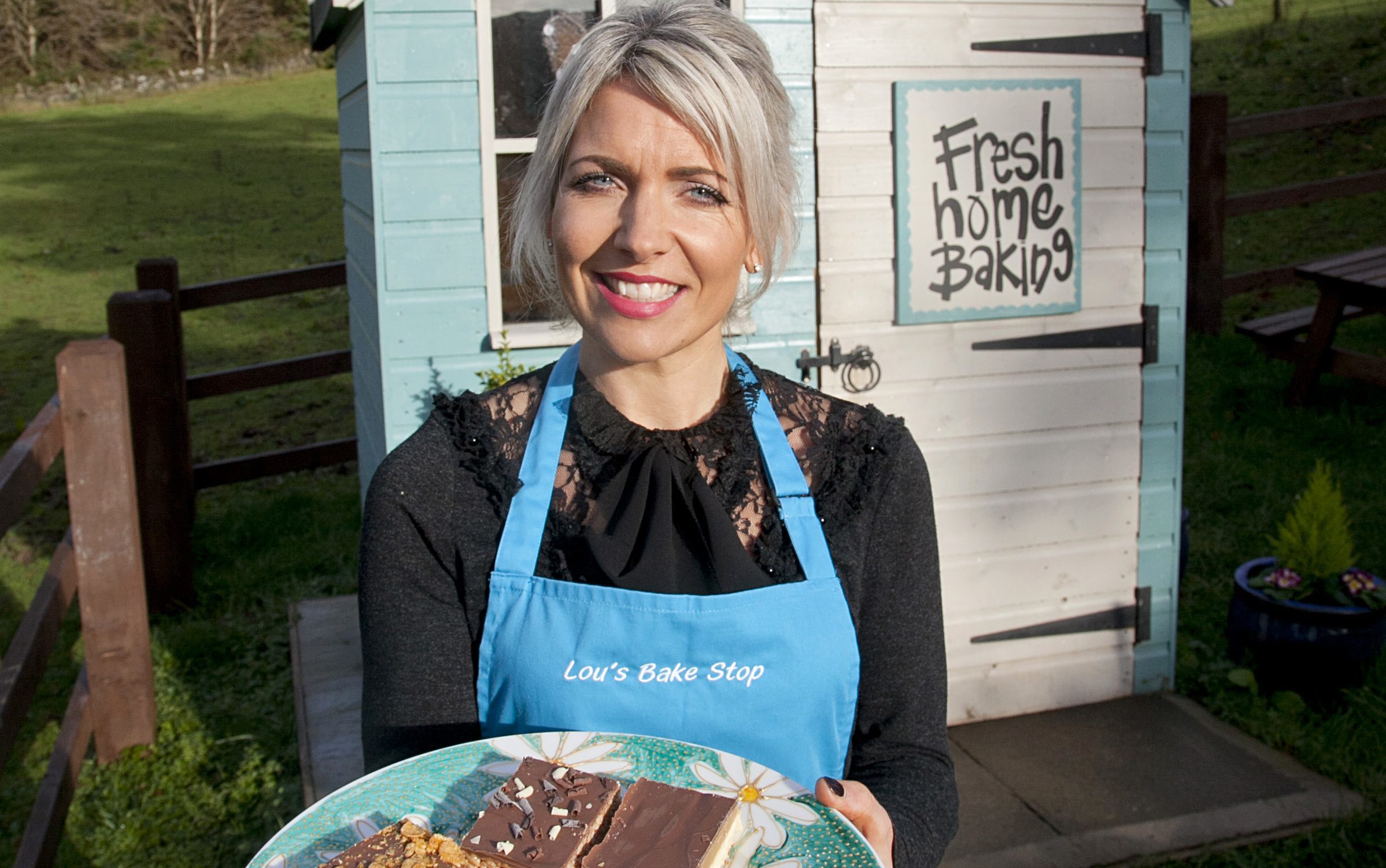 Louise Paterson at her cake hut with an honesty box, just outside Balfron (Alistair Linford)