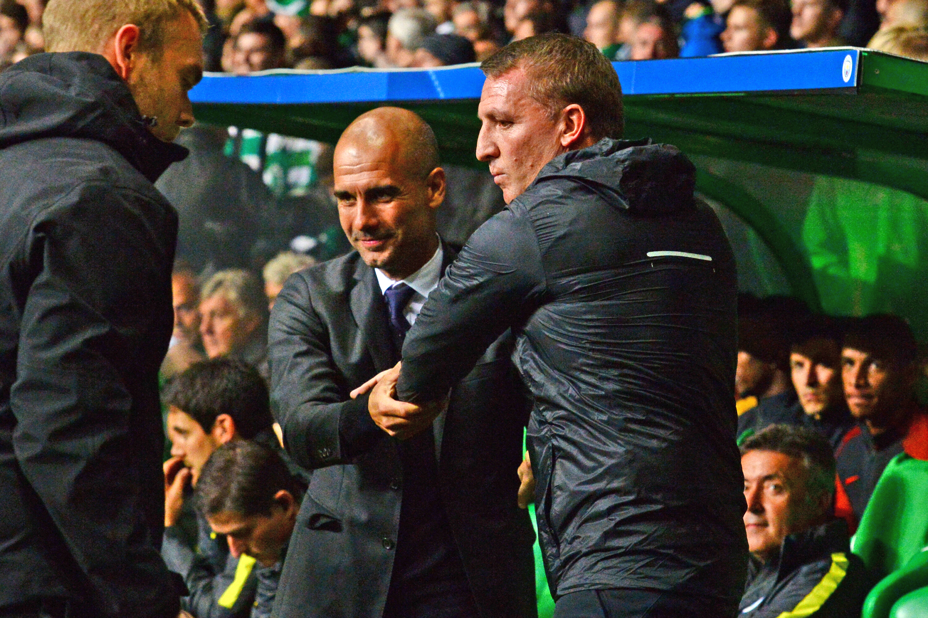 Celtic manager Brendan Rodgers shakes hands with Pep Guardiola (SNS)