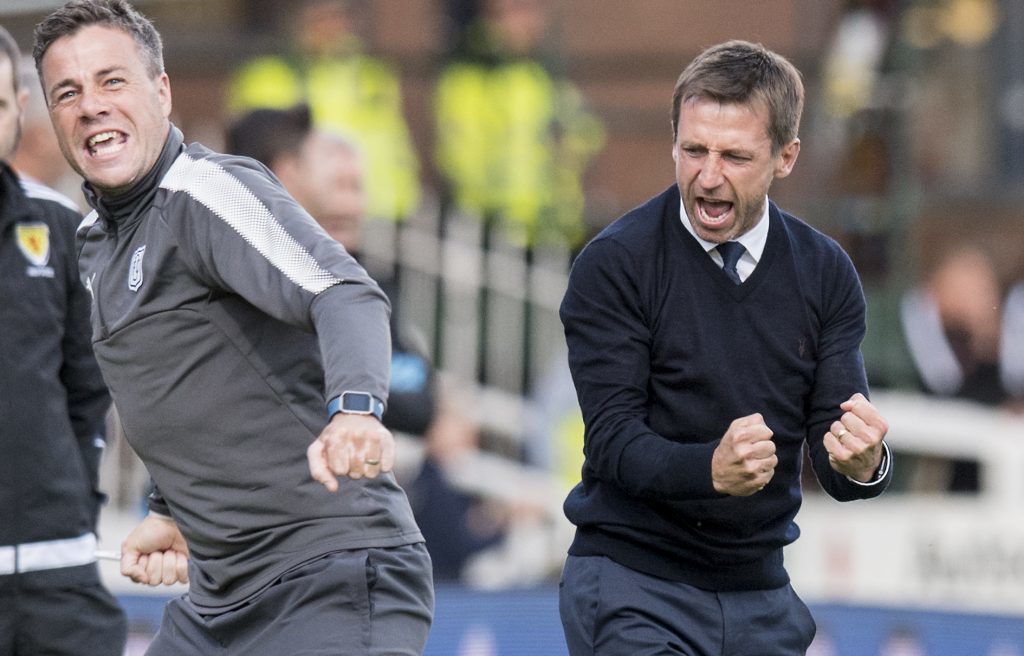 Dundee manager Neil McCann and assistant manager Graham Gartland celebrate (SNS)