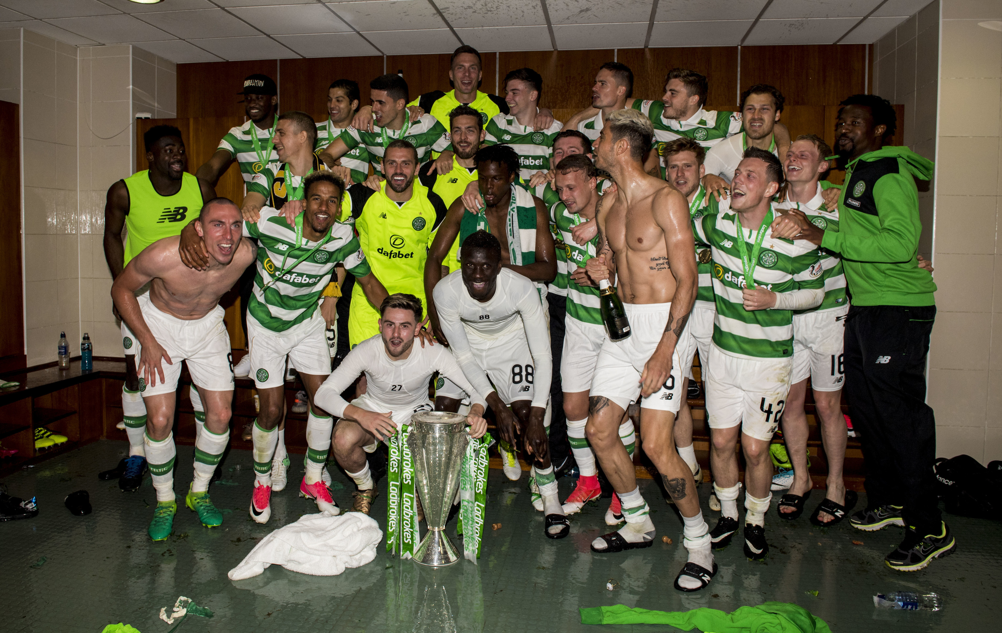 Celtic celebrate another Premiership title inside the home dressing room at Celtic Park back in May (SNS Group / Craig Williamson)