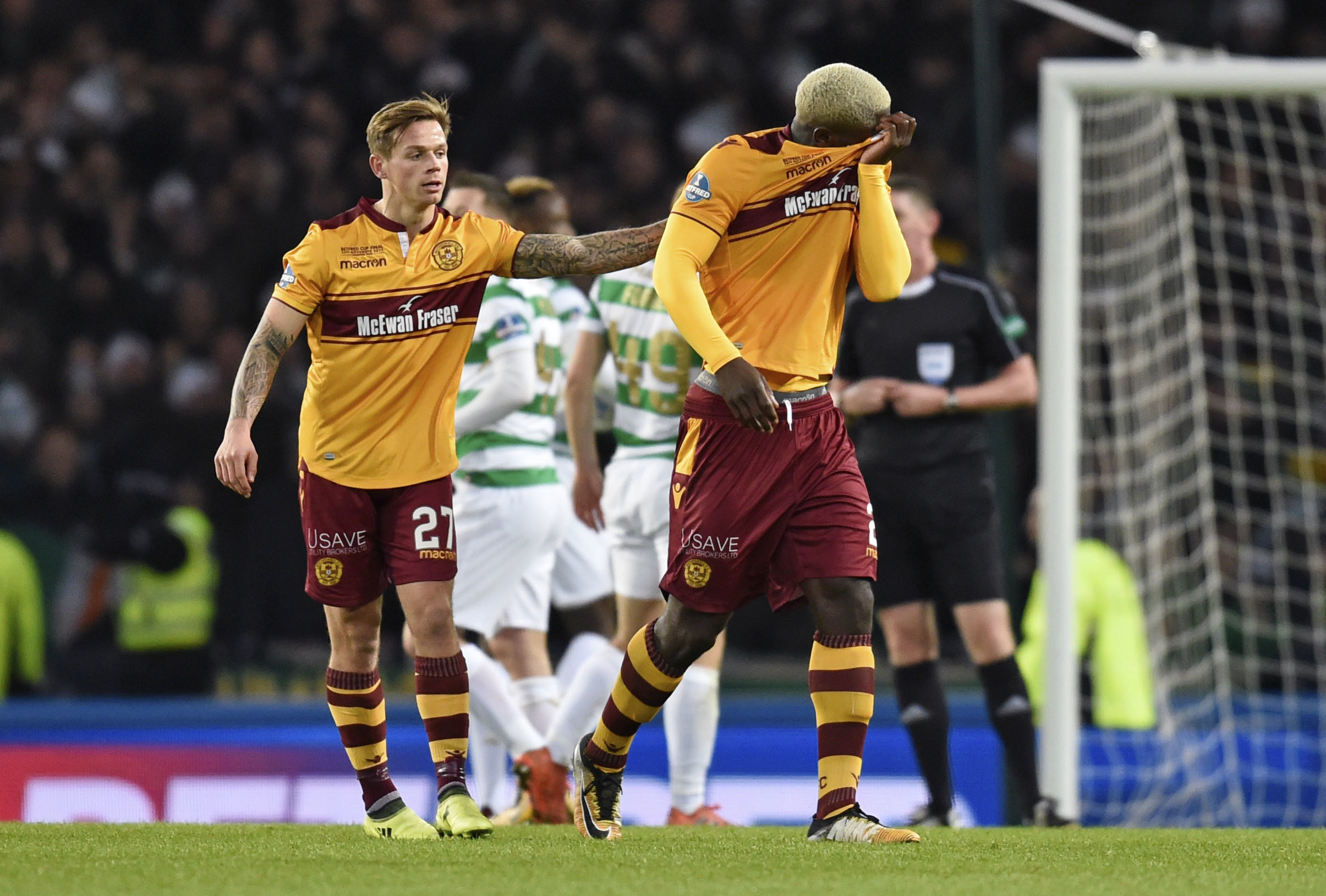 Motherwell's Cedric Kipre is left frustrated as he is sent off (SNS)