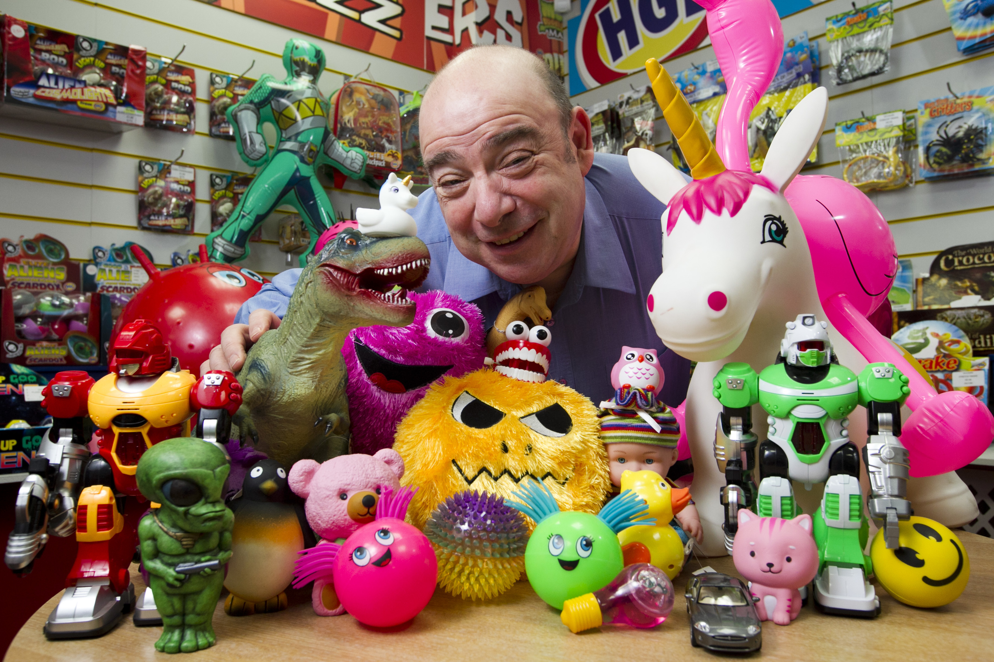 Martin Grossman in his warehouse which is overflowing with robots, aliens, unicorns and other delights (Andrew Cawley / DC Thomson)