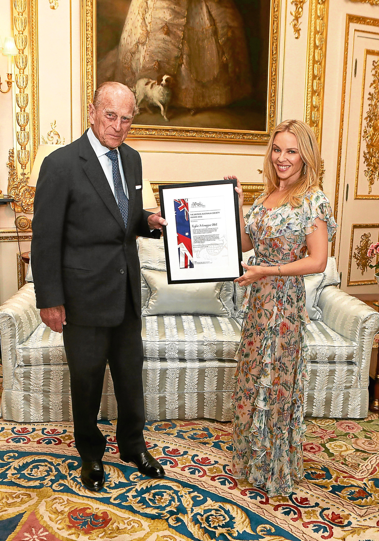 The Duke of Edinburgh, presents Kylie Minogue with the Britain-Australia Society Award for 2016 (Steve Parsons/PA Wire)