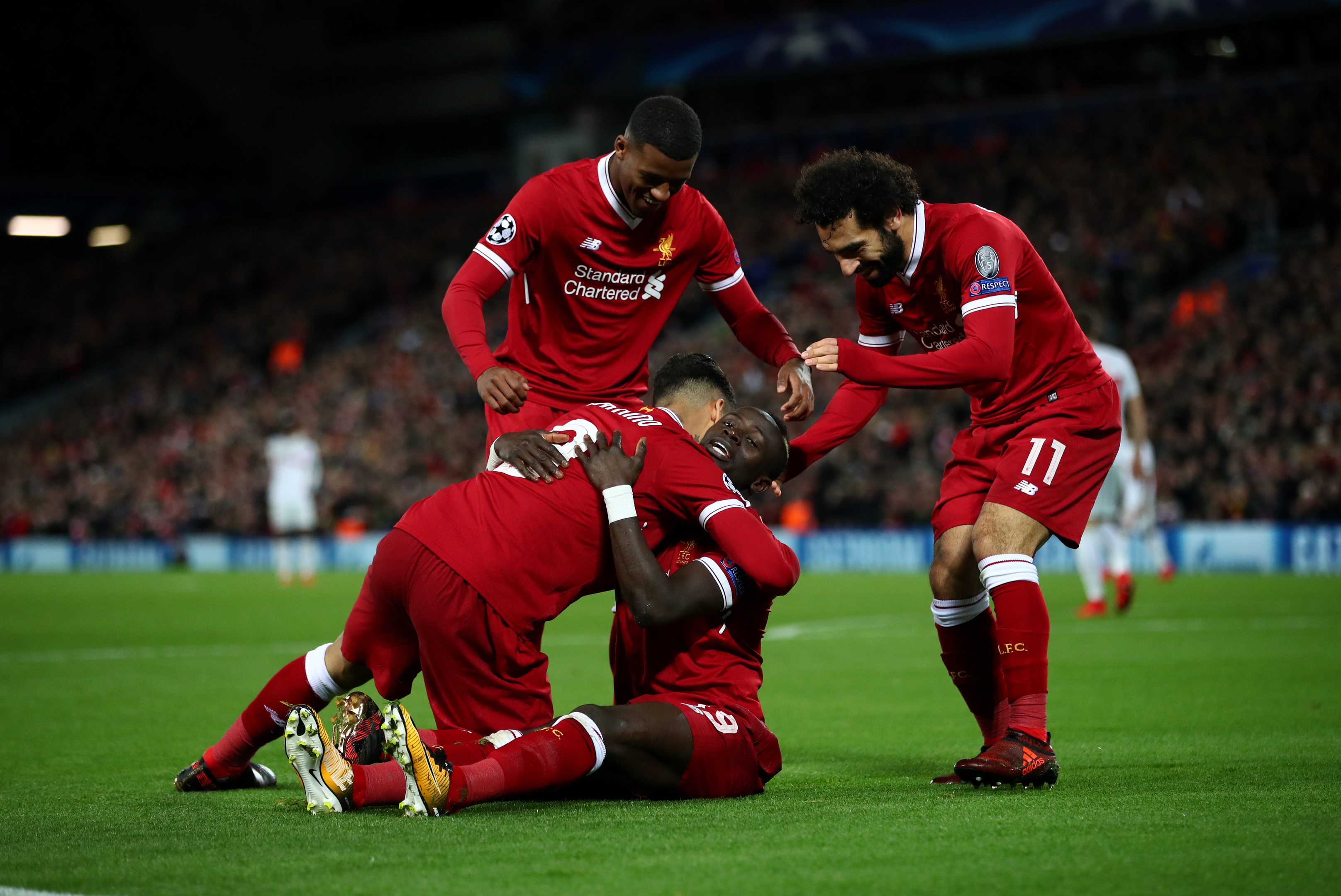 Sadio Mane of Liverpool celebrates scoring the 4th Liverpool goal with his teammates (Clive Brunskill/Getty Images)