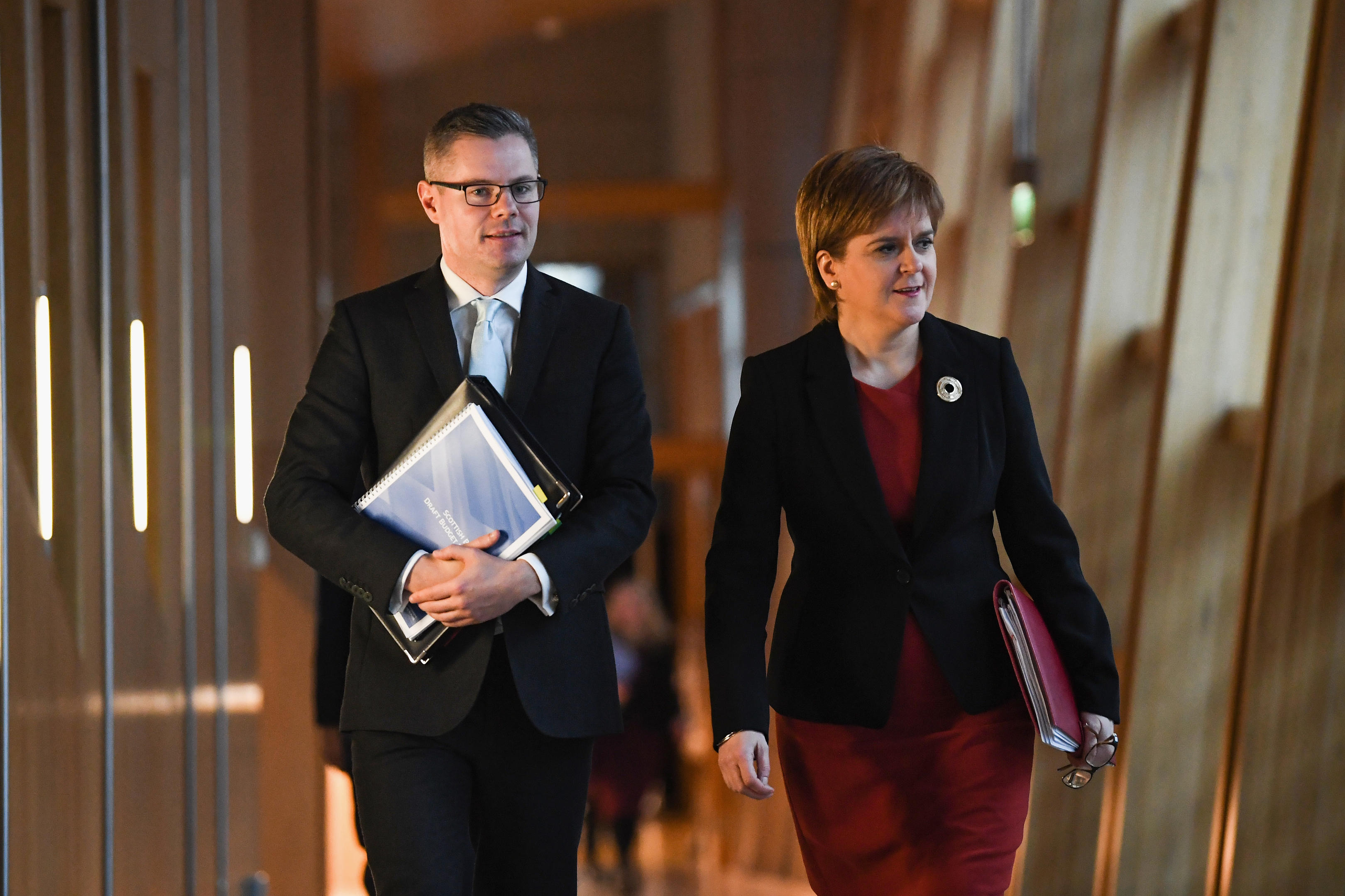 Finance Secretary Derek Mackay and Scotland's First Minister Nicola Sturgeon  (Jeff J Mitchell/Getty Images)