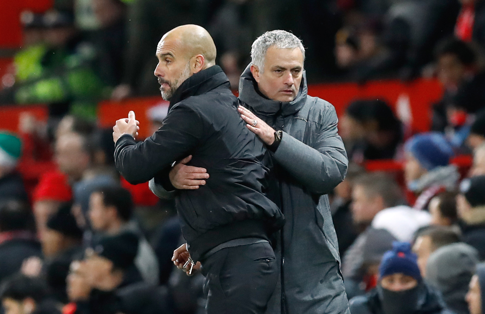 Manchester City manager Pep Guardiola (left) and Manchester United manager Jose Mourinho after the final whistle of the Premier League match at Old Trafford, Manchester. (PA Wire)