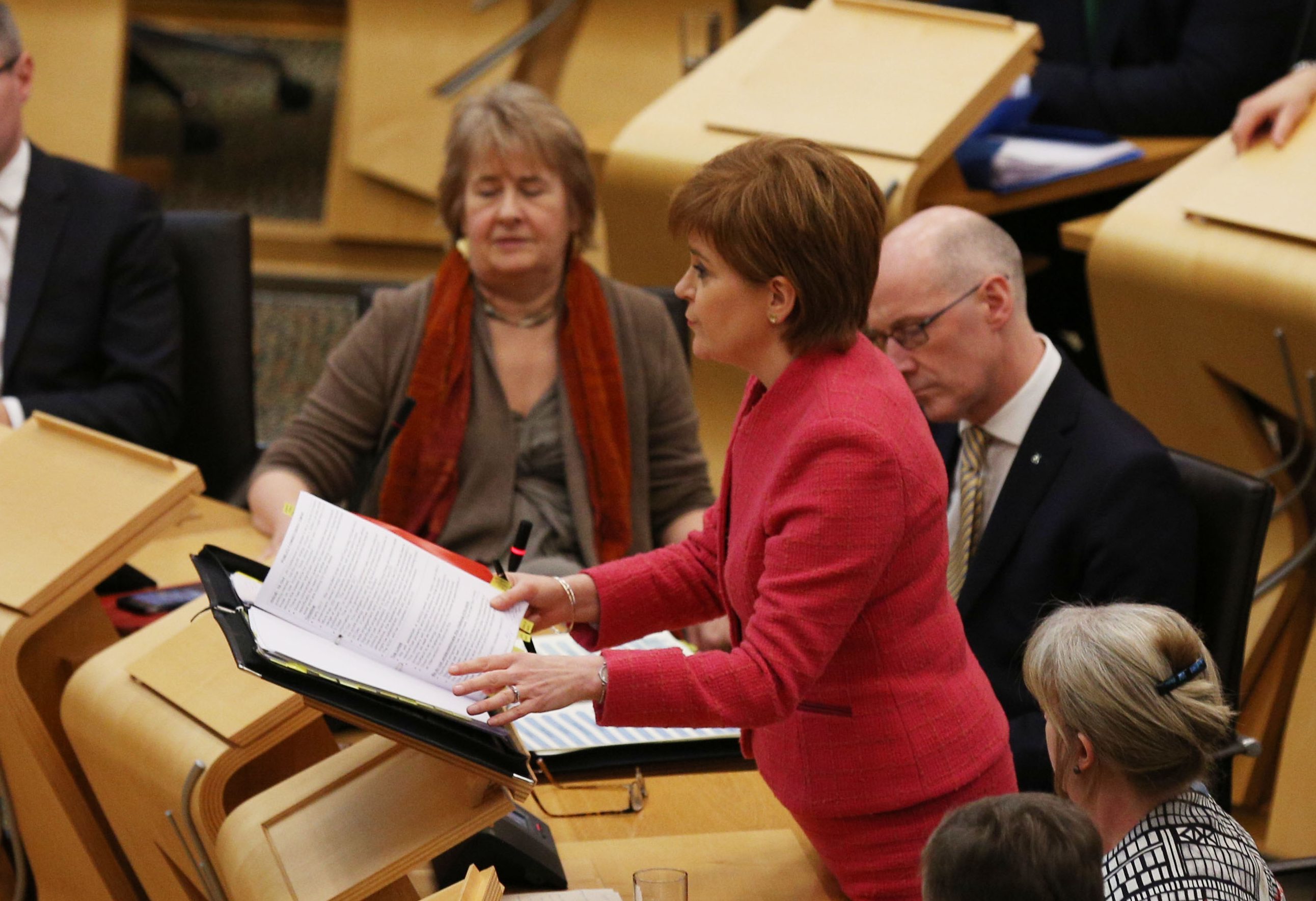 First Minister Nicola Sturgeon in the debating chamber during FMQs at the Scottish Parliament in Edinburgh (David Cheskin/PA Wire)