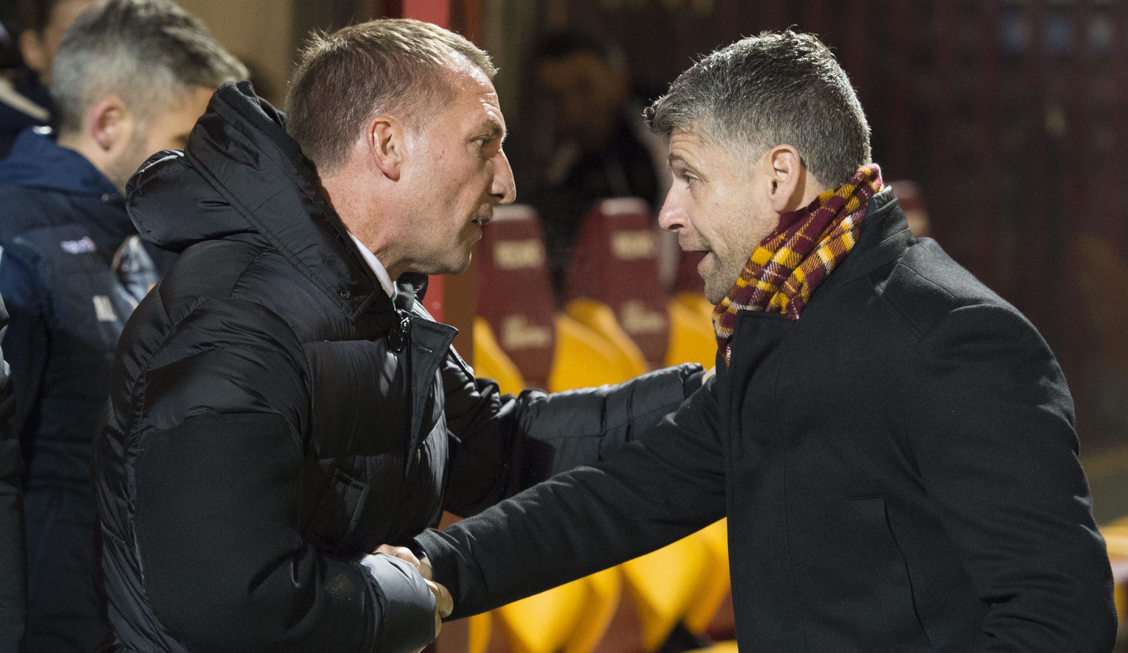 Celtic manager Brendan Rodgers shakes hands with countryman Motherwell manager Stephen Robinson (SNS Group / Ross Parker)