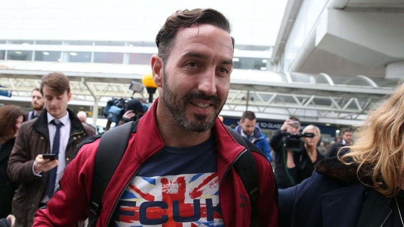 Billy Irving arrives at Glasgow Airport (Andrew Milligan / PA)