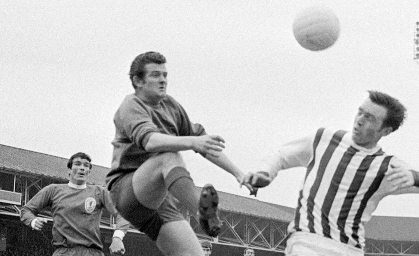 Tommy Lawrence (centre) in action for Liverpool (PA Archive)