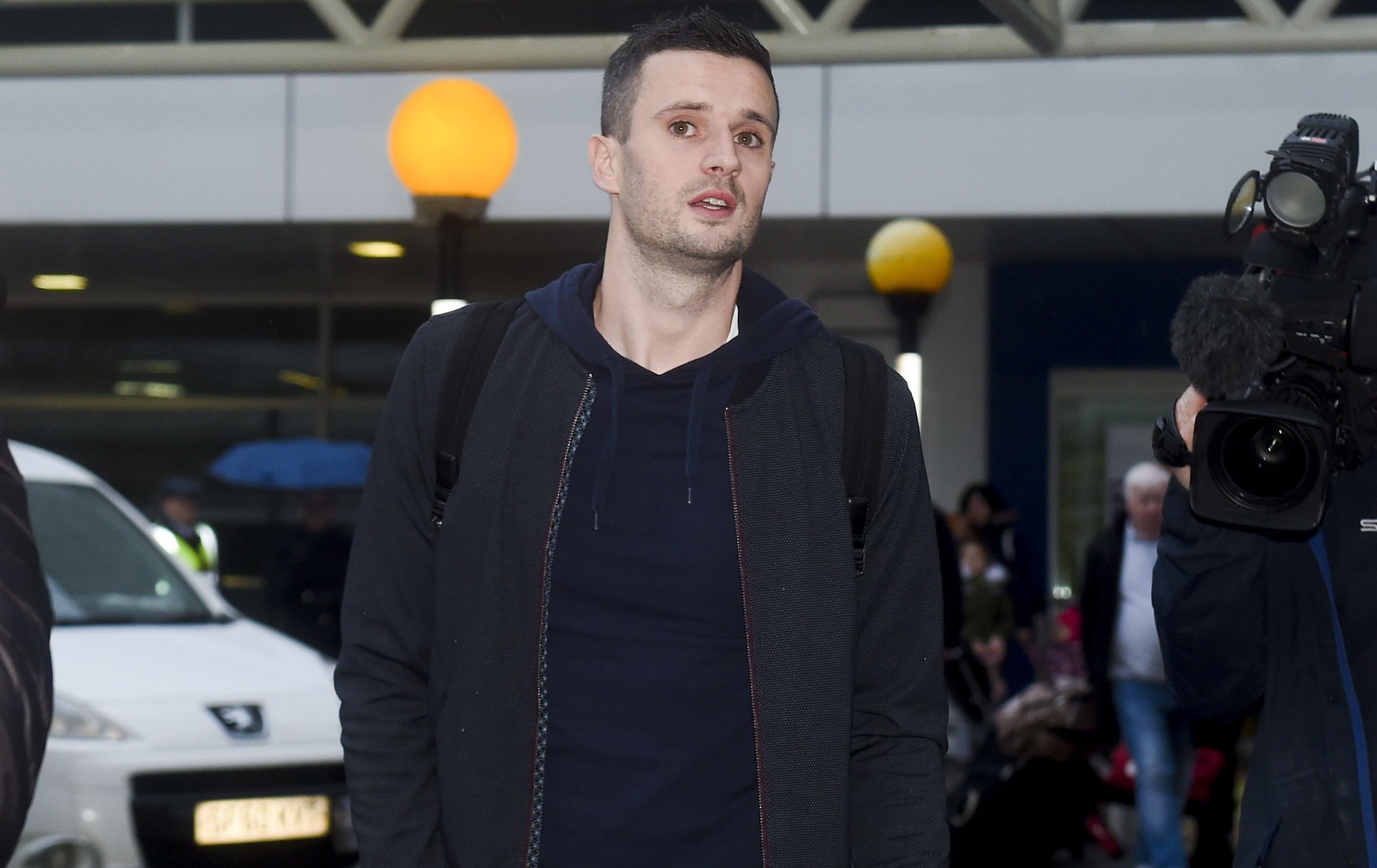 Rangers target Jamie Murphy arrives at Glasgow Airport (SNS Group)
