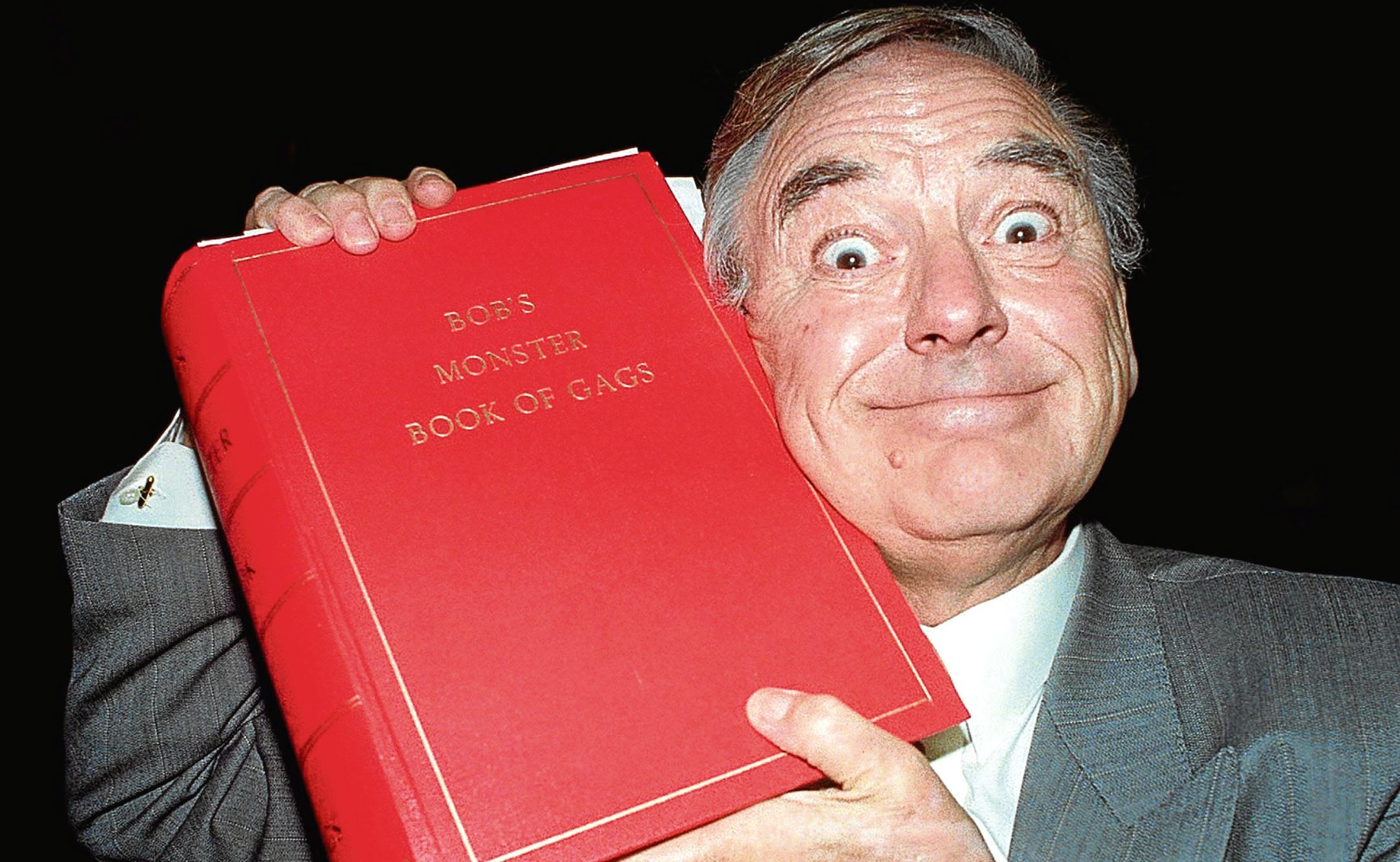 Bob with one of his priceless joke books (David Cheskin/PA)