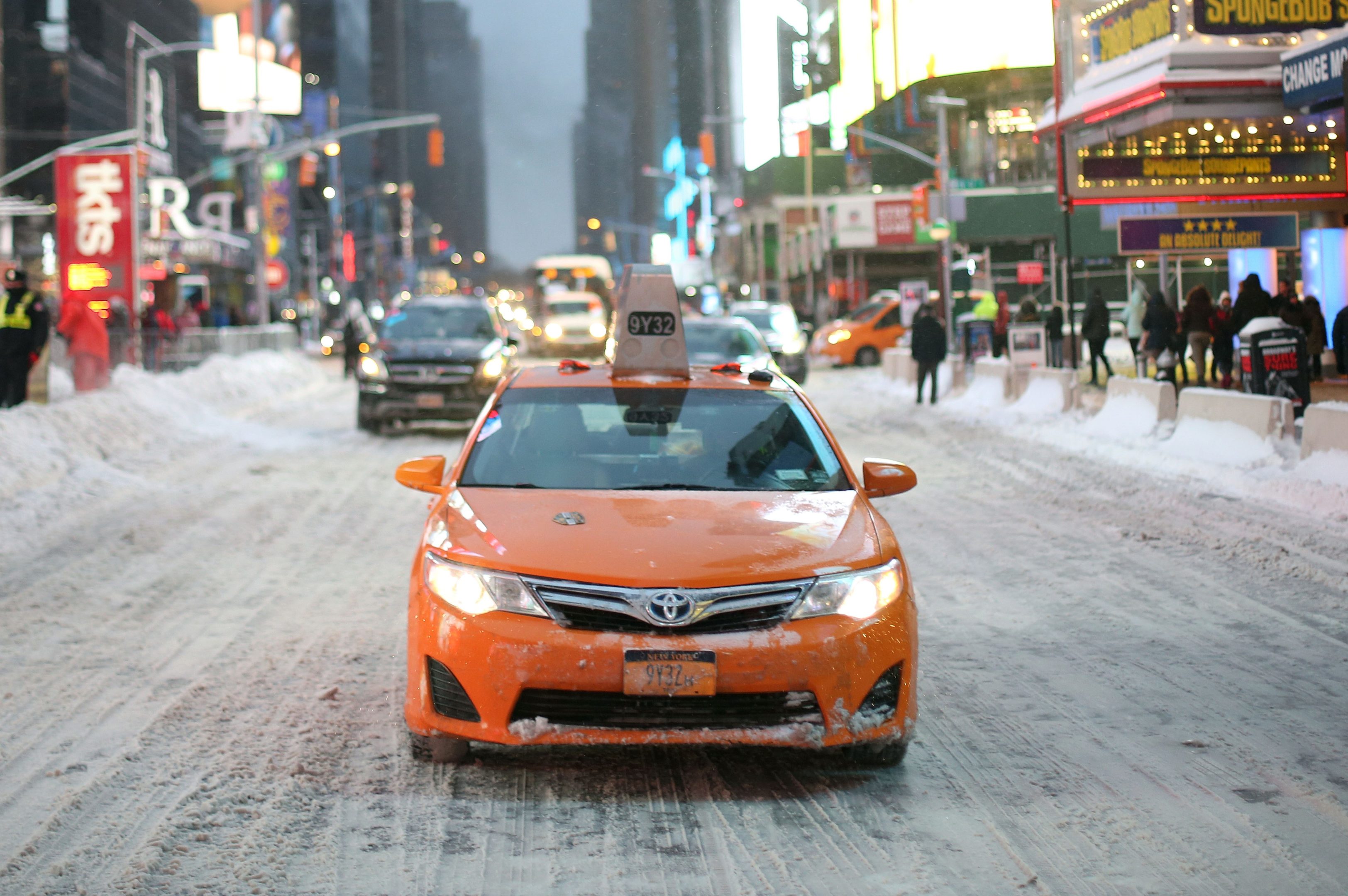 A cab is seen in Times Square during a snowstorm in Manhattan (Mohammed Elshamy/Anadolu Agency/Getty Images)