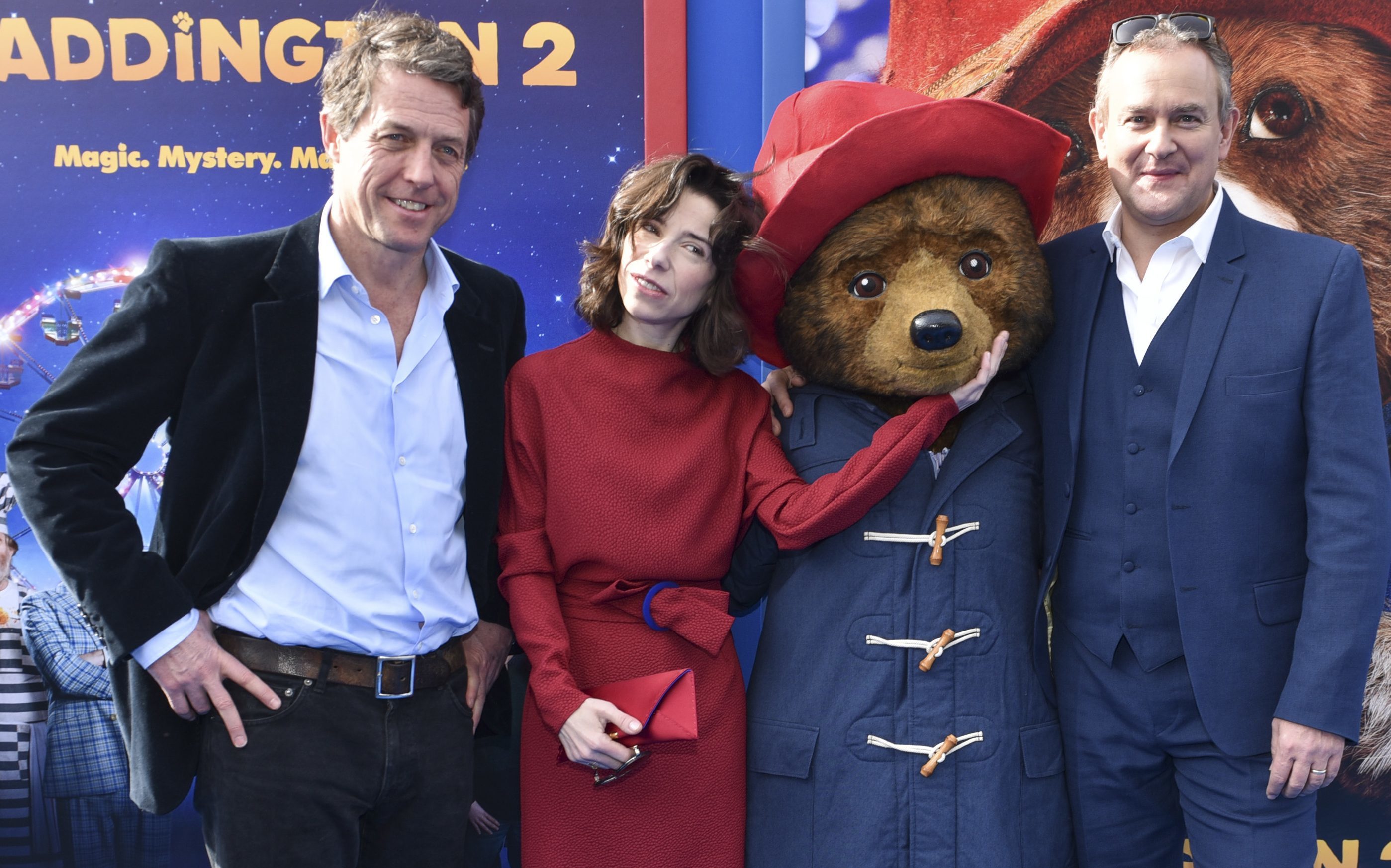 Actors Hugh Grant, Sally Hawkins, and Hugh Bonneville arrive at the premiere of Paddington 2 (Rodin Eckenroth/Getty Images)