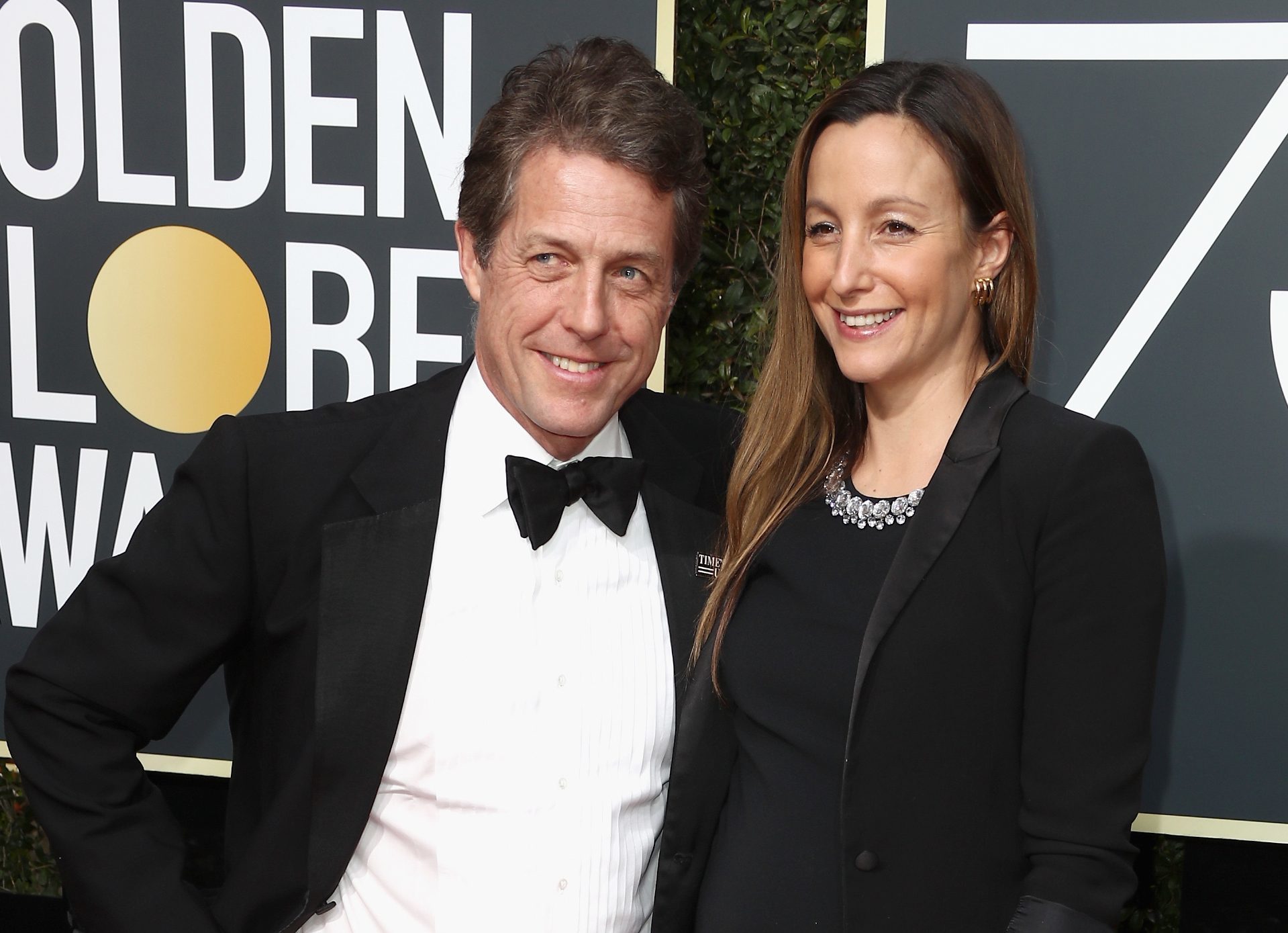 Hugh Grant and Anna Eberstein attend The 75th Annual Golden Globe Awards (Frederick M. Brown/Getty Images)