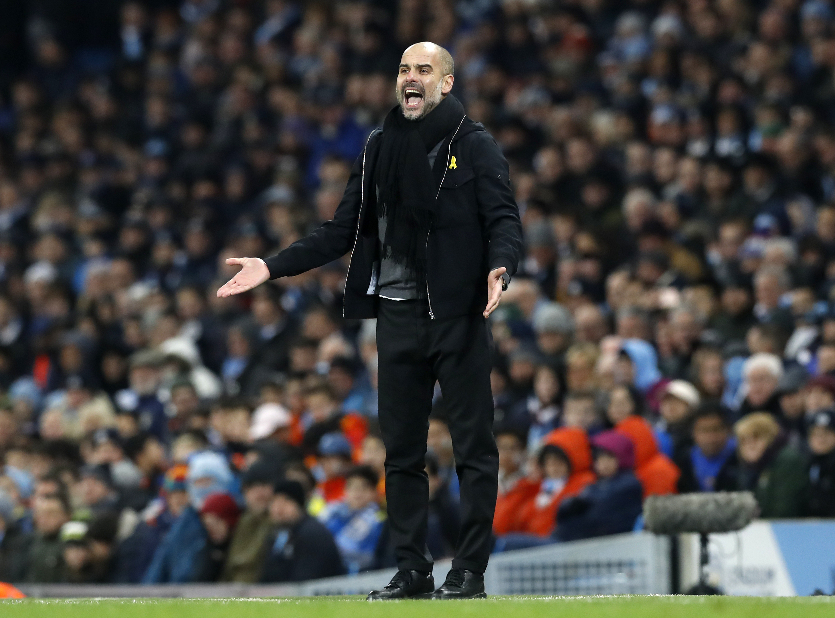 Manchester City manager Pep Guardiola gestures on the touchline (Martin Rickett/PA Wire.)
