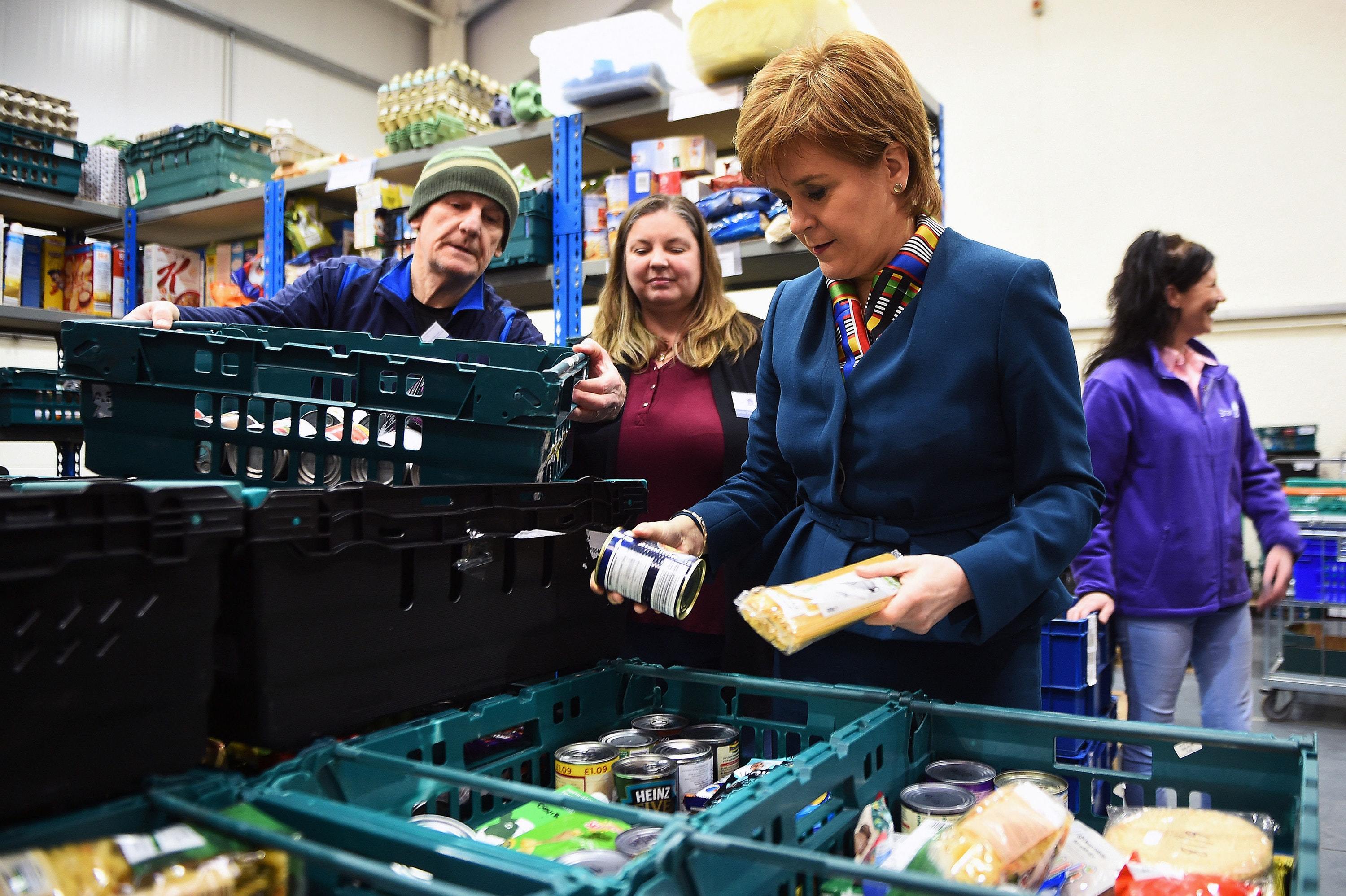 Scotland’s First Minister Nicola Sturgeon visits food bank (Andy Buchanan/PA)