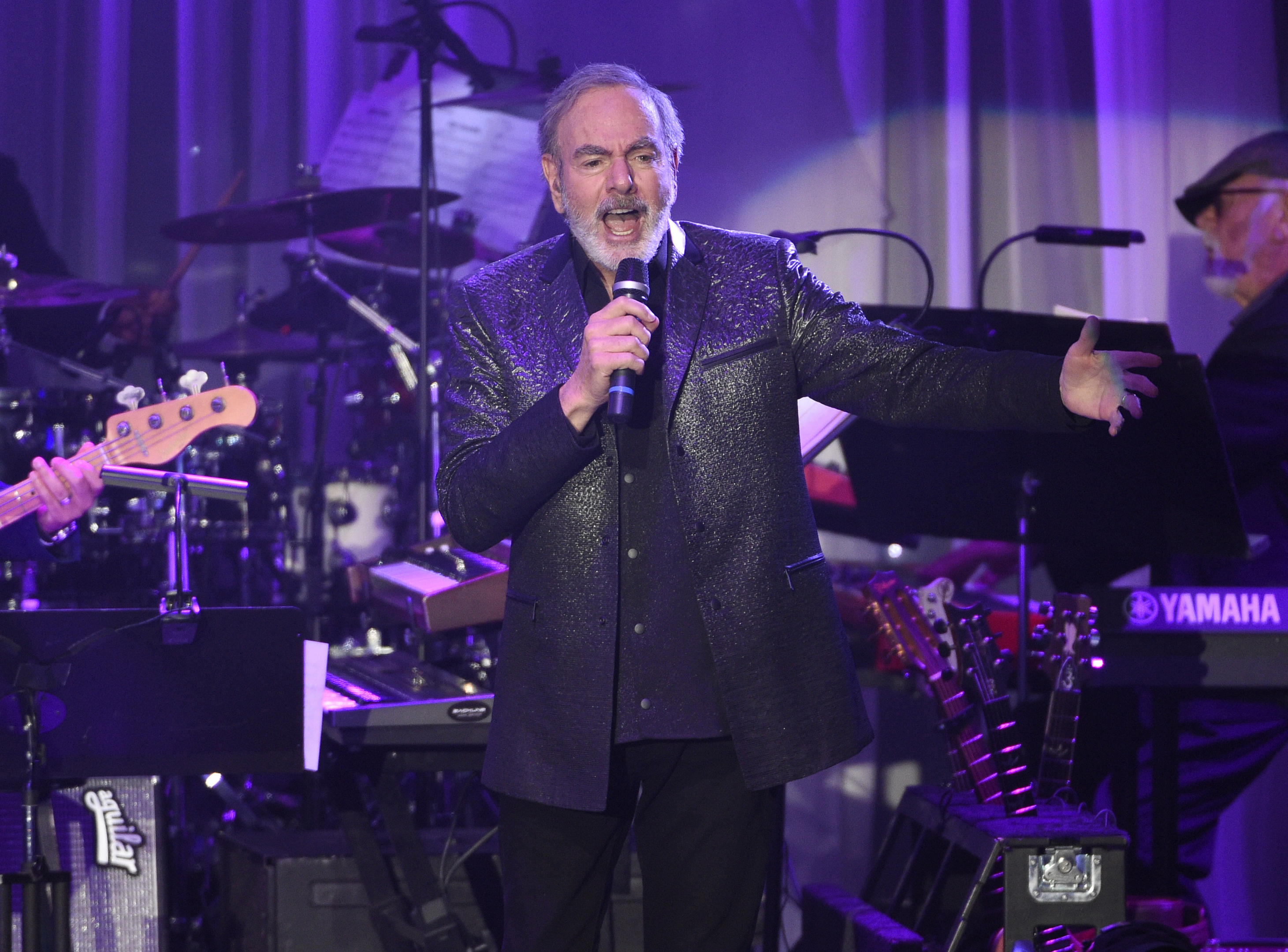 Neil Diamond announced he was retiring from touring after being diagnosed with Parkinson’s (Chris Pizzello/Invision/AP)