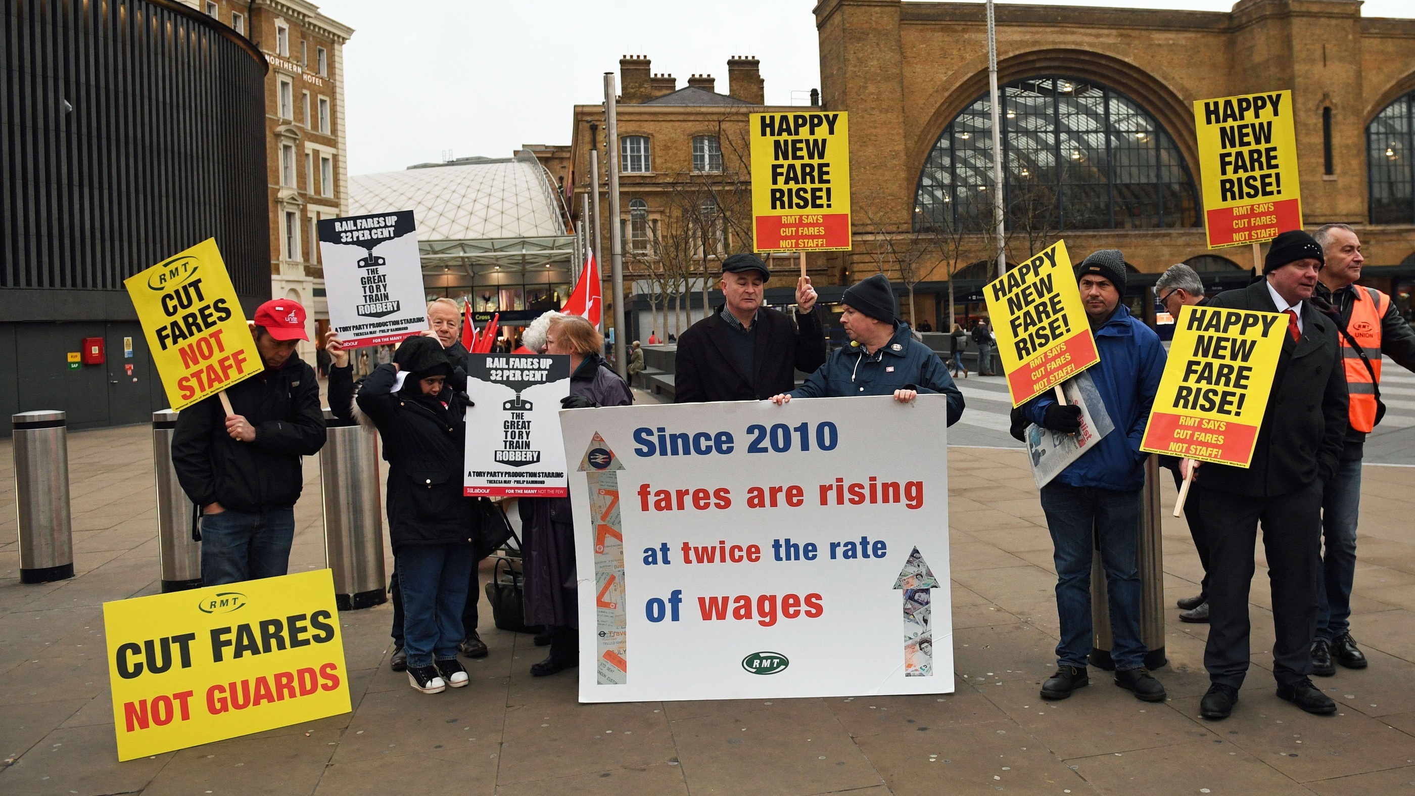Campaigners protest outside King's Cross station (Stefan Rousseau/PA)