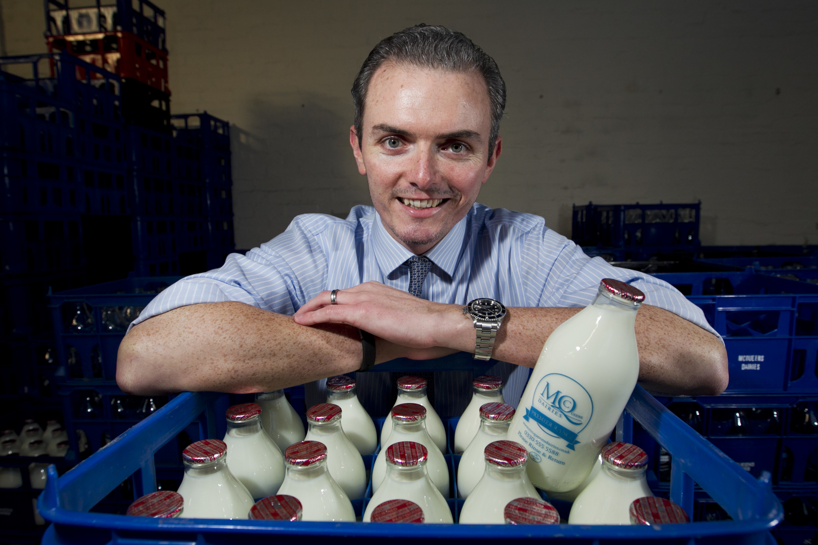 Callum McQueen, owner of McQueen's Dairy, which is seeing rising demand from people wanting glass milk bottles delivered to their door (Andrew Cawley / DC Thomson)