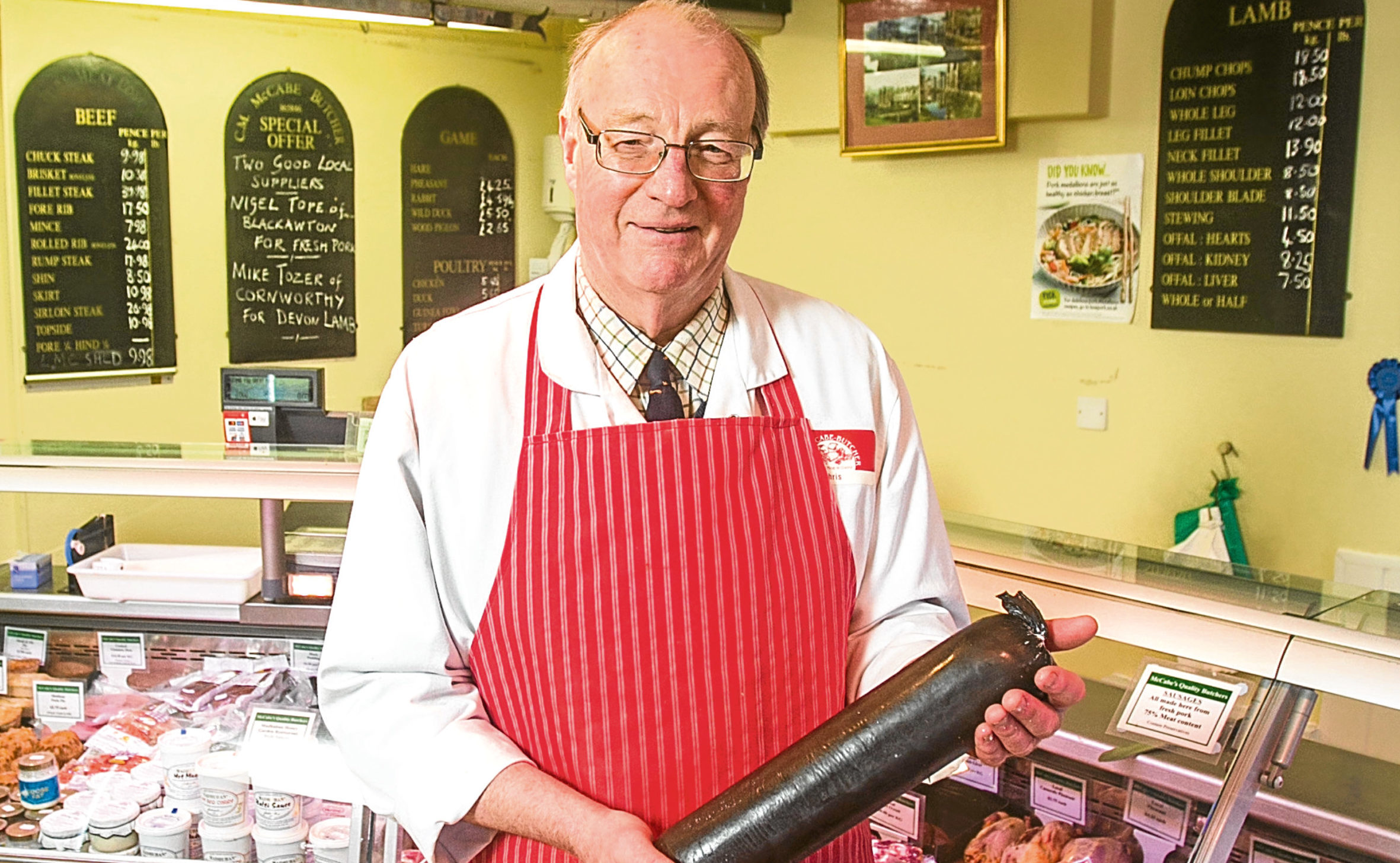 Christopher McGabe at his butchers shop in Totnes, Devon. (SWNS)