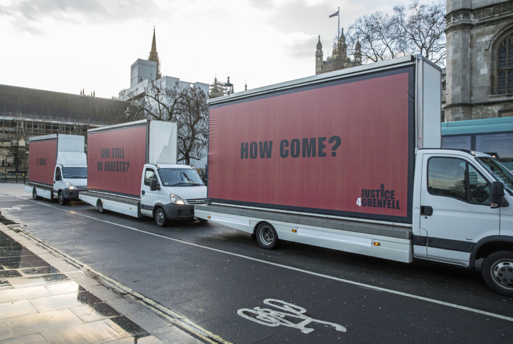 Three billboards outside the Houses of Parliament in Westminsters (Jeff Moore/Justice4Grenfell/PA Wire)