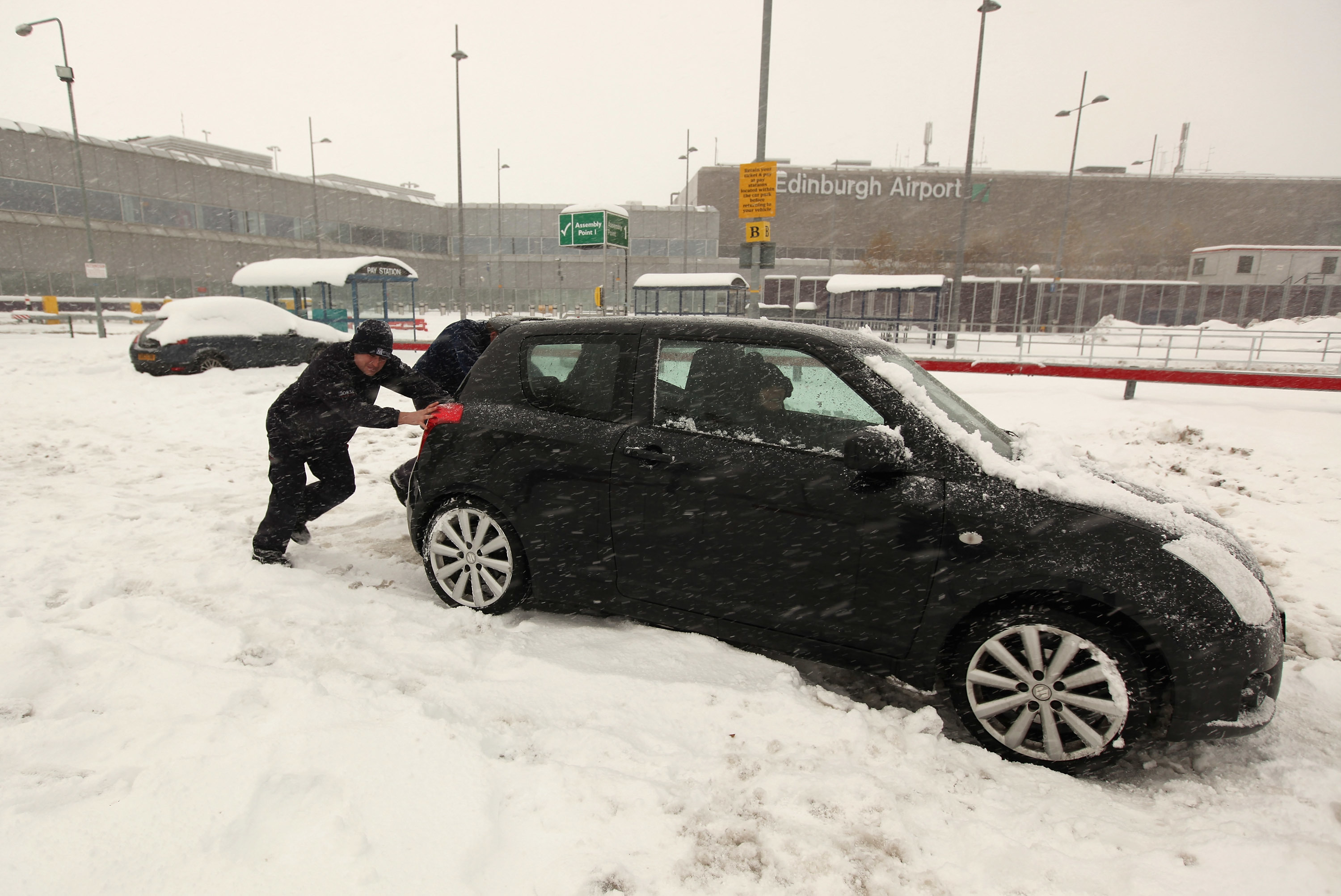 These motorists were caught out by the late winter at Edinburgh Airport in 2010 (Jeff J Mitchell/Getty Images)