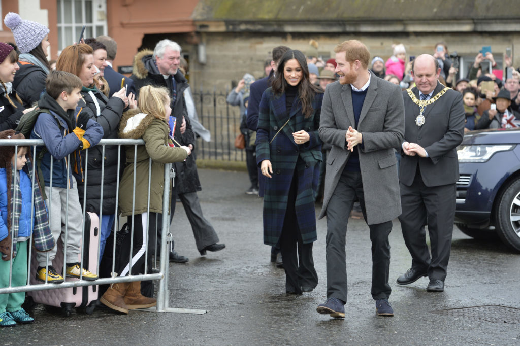 Prince Harry and Meghan Markle during a walkabout on the esplanade at Edinburgh Castle, during their visit to Scotland. (John Linton/PA Wire)