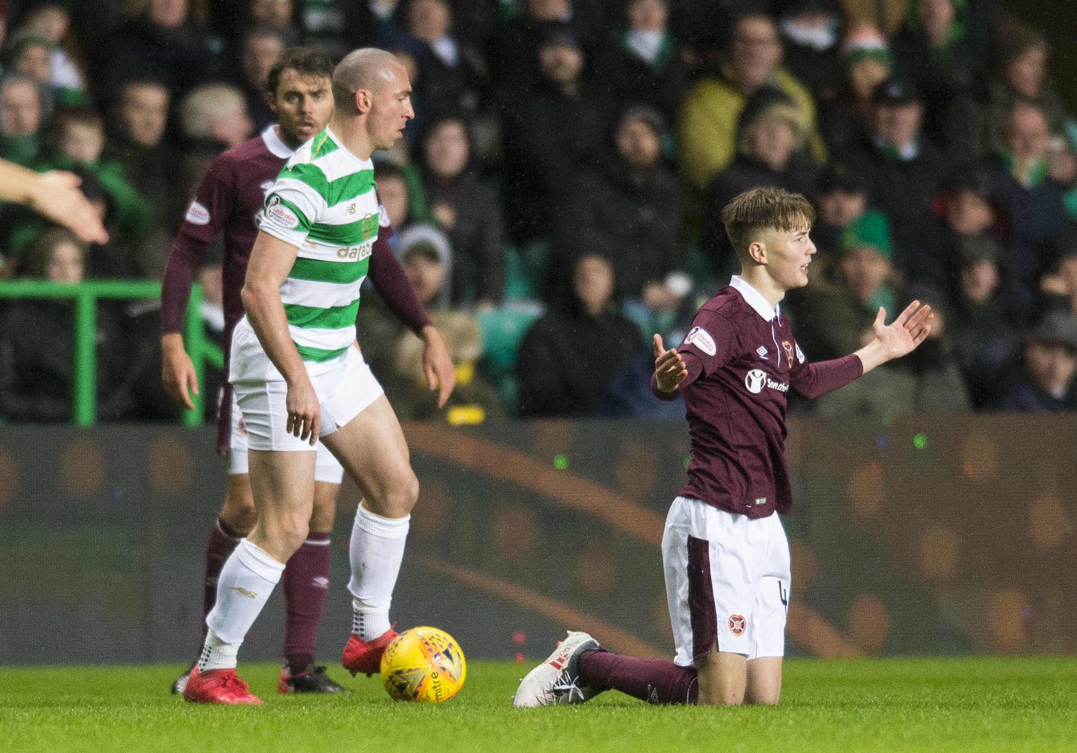 Celtic's Scott Brown and Hearts' Harry Cochrane during the match (SNS Group / Ross MacDonald)