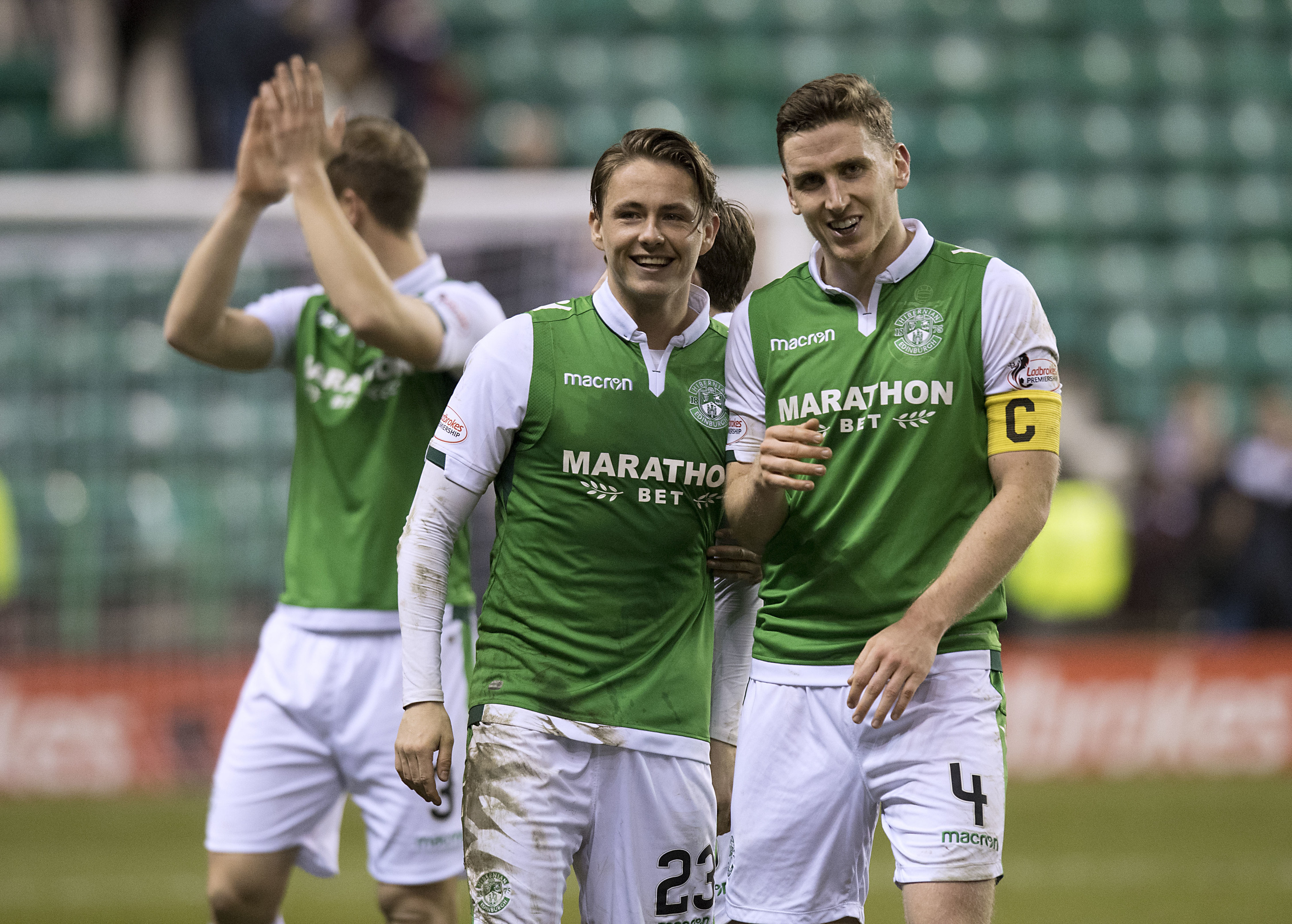 Paul Hanlon (right) celebrates with Scott Allan at full time in the Edinburgh Derby (SNS Group)