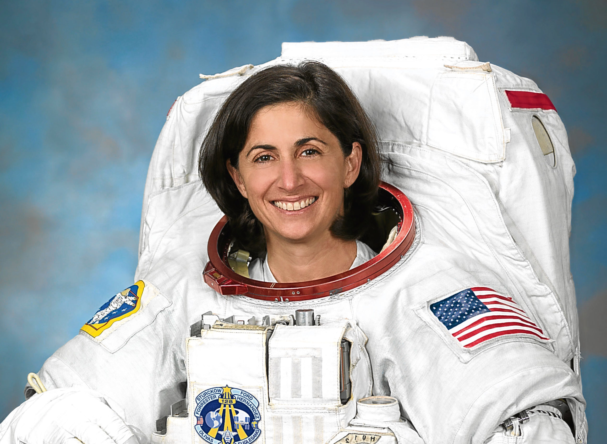 Official Portrait of NASA Astronaut Nicole Stott in an EUM. (Robert Markowitz)