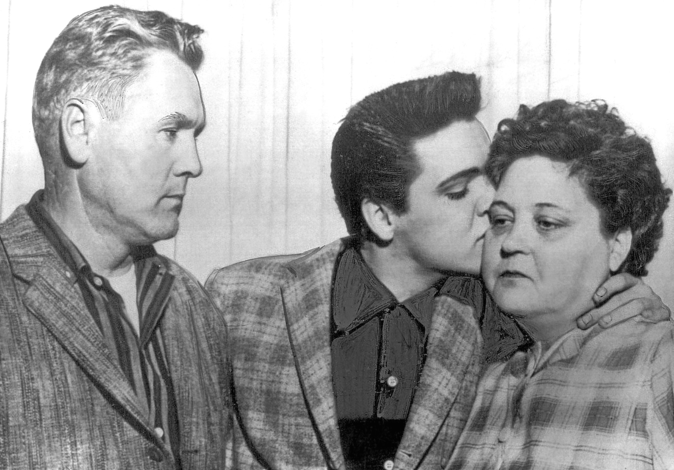 Elvis says goodbye to his dad, Vernon, and beloved mum, Gladys, as he prepares to enter the military (Everett Collection Inc / Alamy)