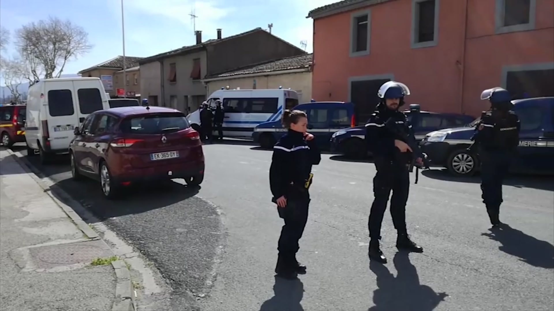 French counterterrorism prosecutors are taking charge of the investigation into the shooting of a police officer in southern France that has led to an apparent hostage-taking at a supermarket. (La Depeche Du Midi via AP)